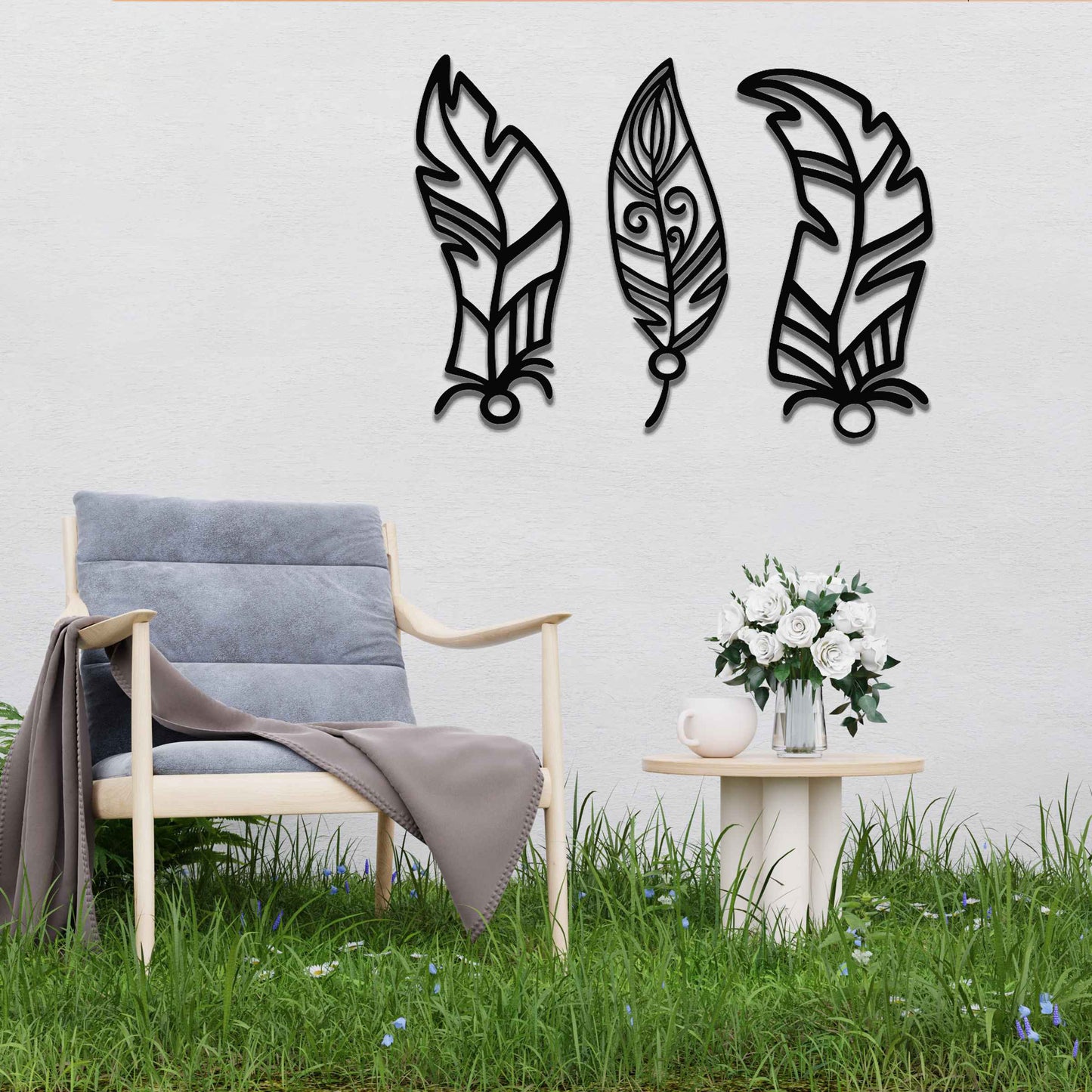 This design features three elegantly styled feathers, each with intricate patterns. The flowing lines and curved shapes give a sense of movement, making the artwork a beautiful representation of nature's delicate beauty.