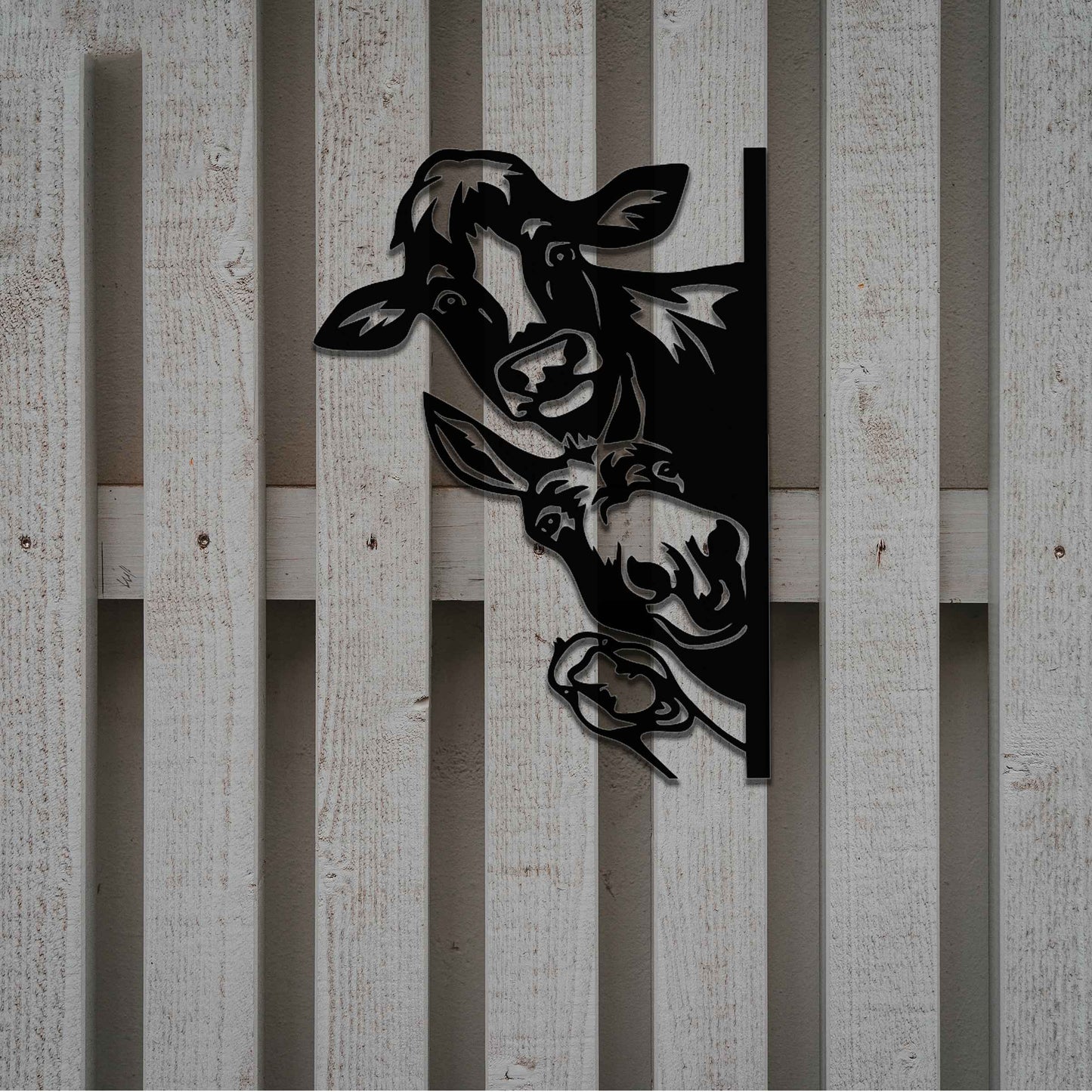 Metal decoration featuring a cow, a donkey, and a goose peeking around a vertical edge, crafted with intricate cutout details and a rustic finish, adding a whimsical and rustic charm to outdoor or garden spaces.