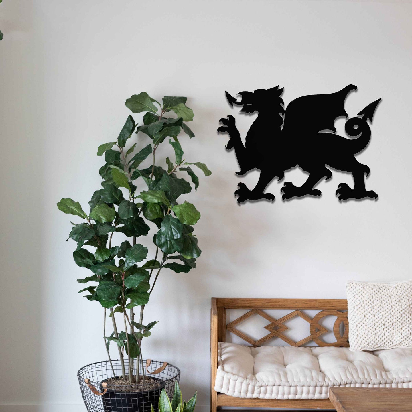 This image features the Welsh dragon, an iconic and powerful symbol of Wales. The design emphasizes the dragon’s fierce stance, with detailed wings, sharp claws, and an arched tail. Its strong profile is bold, representing strength and heritage, while the rustic, weathered finish gives the artwork a timeless, historic feel.