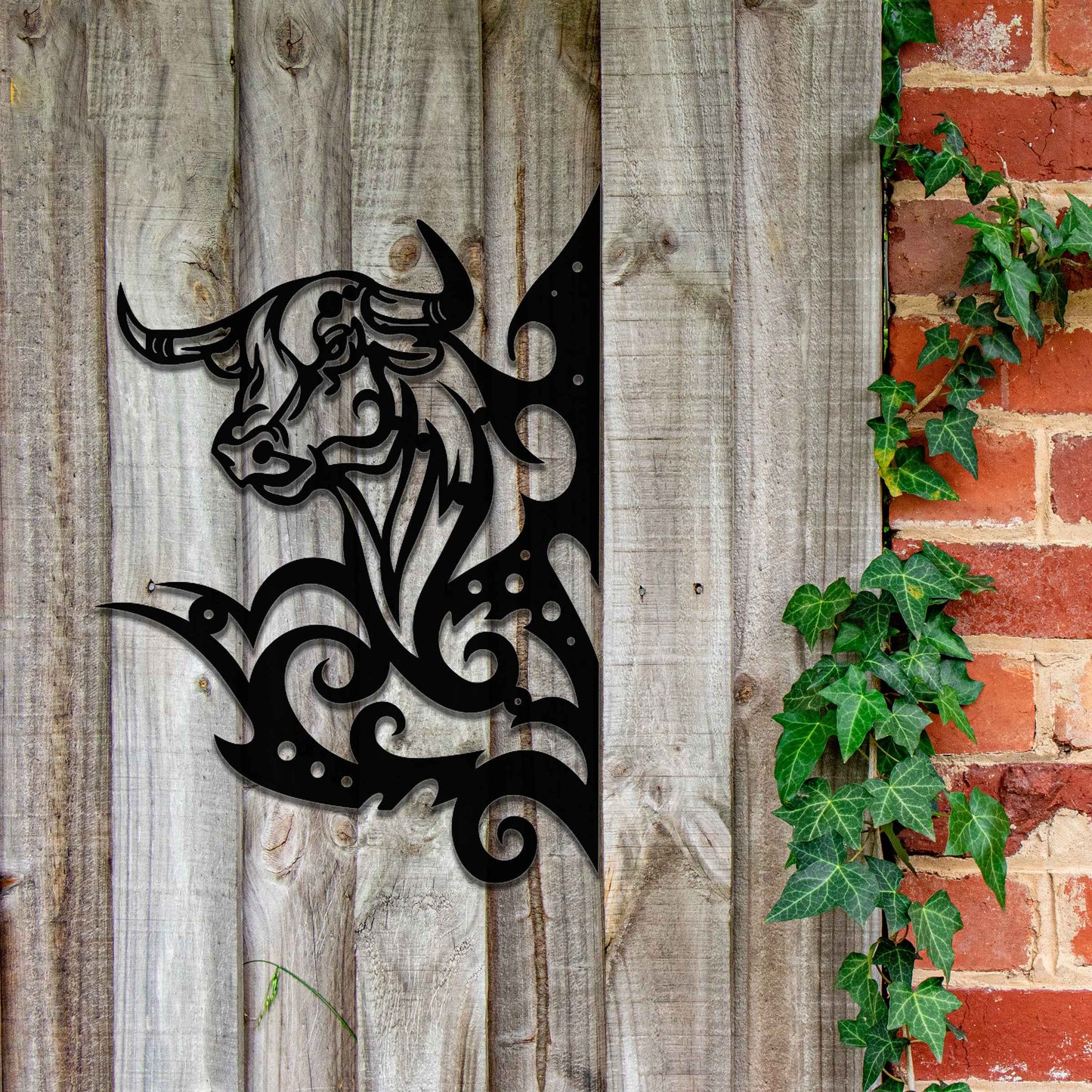 This design showcases a bull's head surrounded by dynamic, swirling lines. The intricate detailing captures the strength and power of the bull, with the bold and stylized swirls adding a sense of motion and energy.