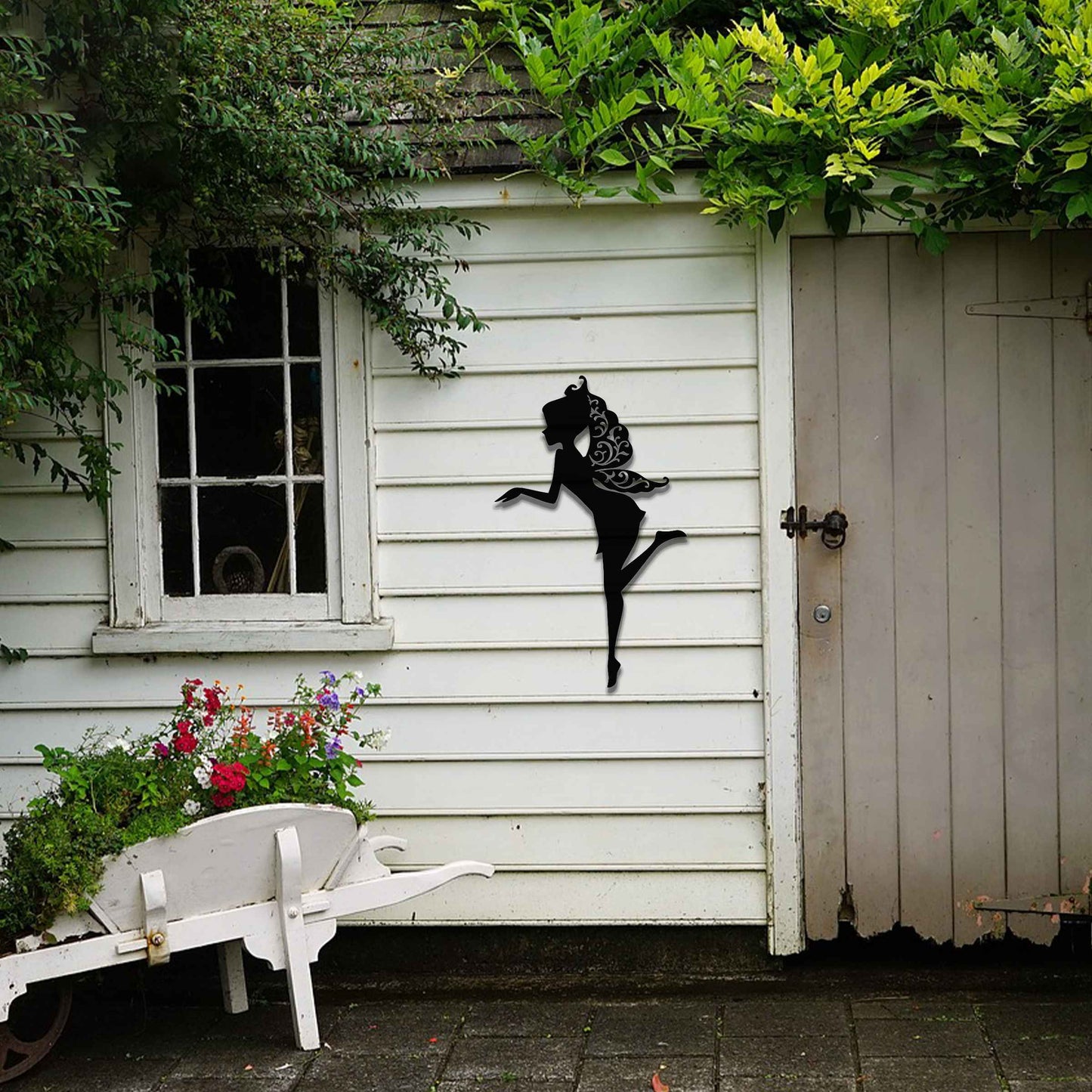 Thank you for the clarification! The design features a silhouette of a fairy in a graceful pose, with flowing hair and wings. The fairy is captured in mid-motion, bringing a sense of whimsy and elegance to the artwork.