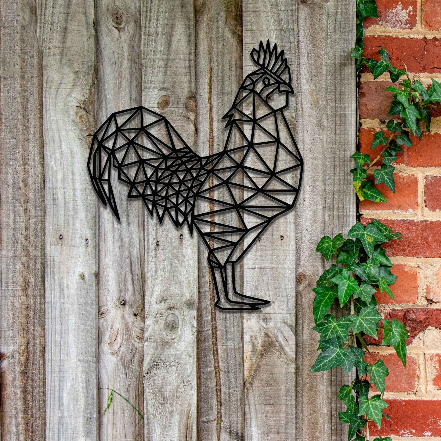 Geometric rooster wall art in a triangular design, made of metal. The rooster is intricately designed with sharp, angular lines that form its body, creating a modern and stylish piece perfect for contemporary spaces.