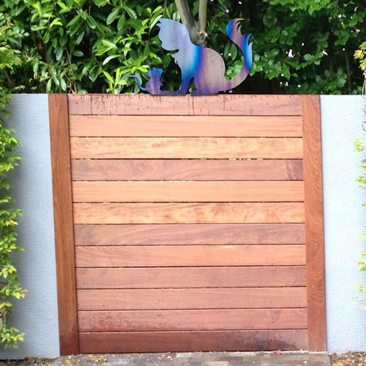Metal garden decoration featuring a silhouette of a cat and mouse in a playful pose, adding a whimsical and rustic charm to outdoor spaces, perfectly suited for fence tops or garden walls.