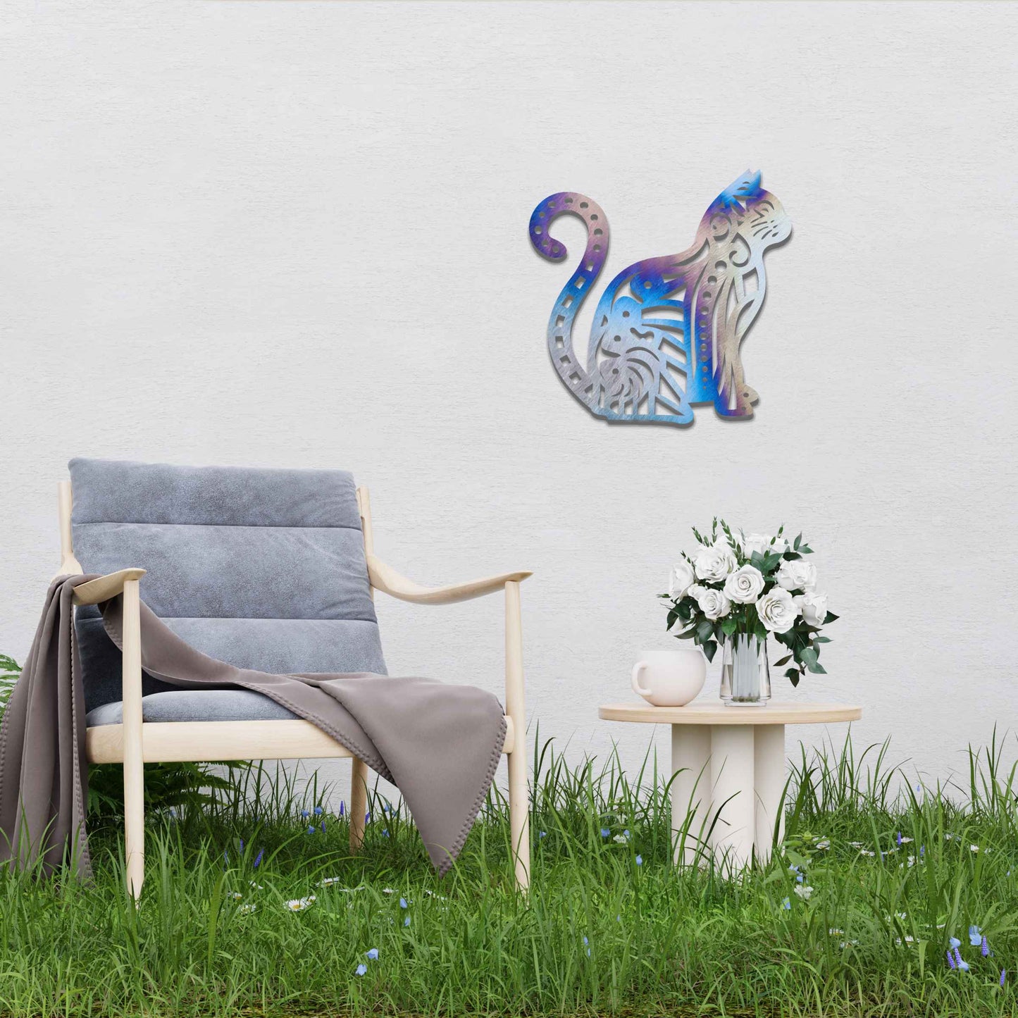 Metal garden decoration featuring a sitting cat with an intricate geometric and swirl pattern, adding a playful and artistic touch to outdoor walls or garden settings.