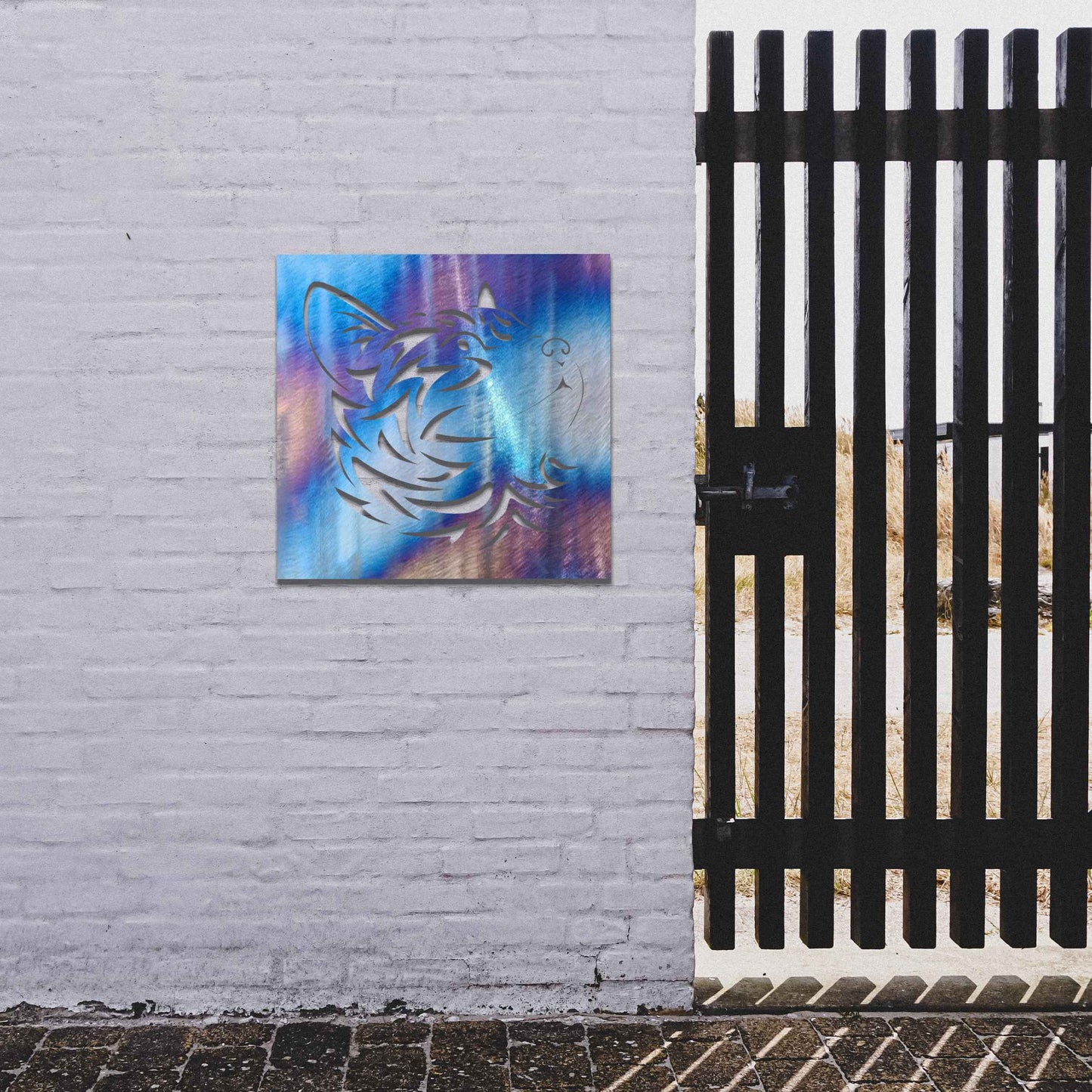 This artwork features a captivating metal design of a cat's face with intricate cut-out details, perfect for a modern, minimalistic decor setting. The cat's profile is beautifully crafted, adding a touch of elegance to any space.