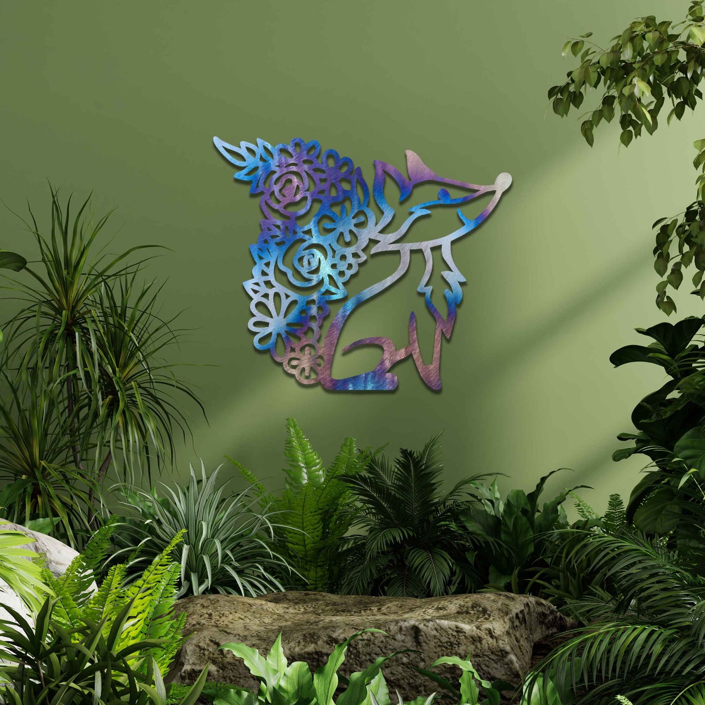 Metal wall decoration featuring a fox silhouette with a floral-patterned tail, crafted with intricate cutout details and a rustic finish, adding a whimsical and elegant touch to indoor or outdoor spaces.