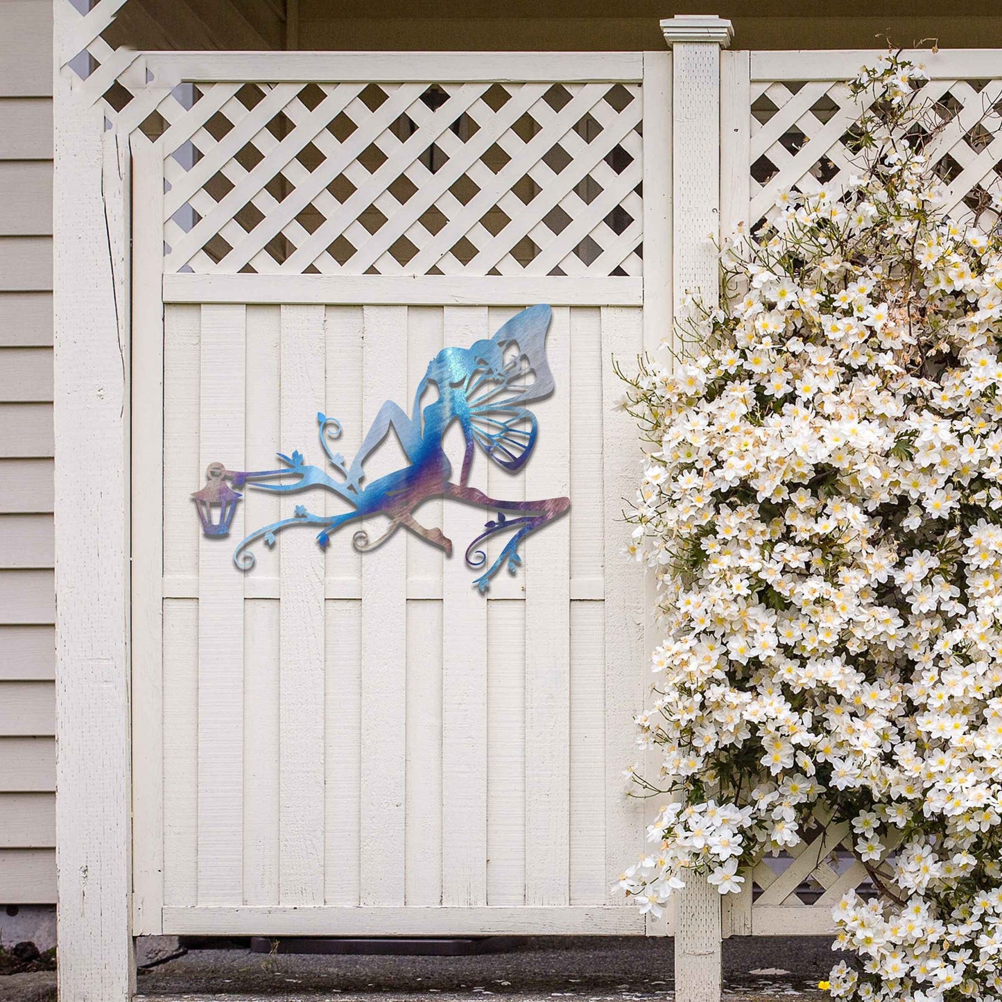 This design features a fairy seated elegantly on a tree branch with intricate vines, accompanied by a charming lantern. The detailed wings and graceful pose of the fairy add a magical, whimsical touch to the piece.