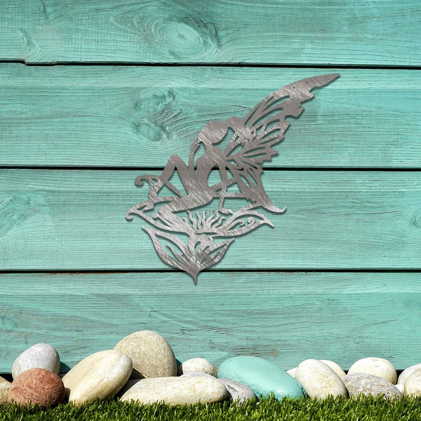 This design features a fairy perched gracefully on a stylized flower, with delicate wings outstretched. The intricate patterns on the wings and the fluid lines of the fairy's pose create a sense of ethereal beauty and enchantment.