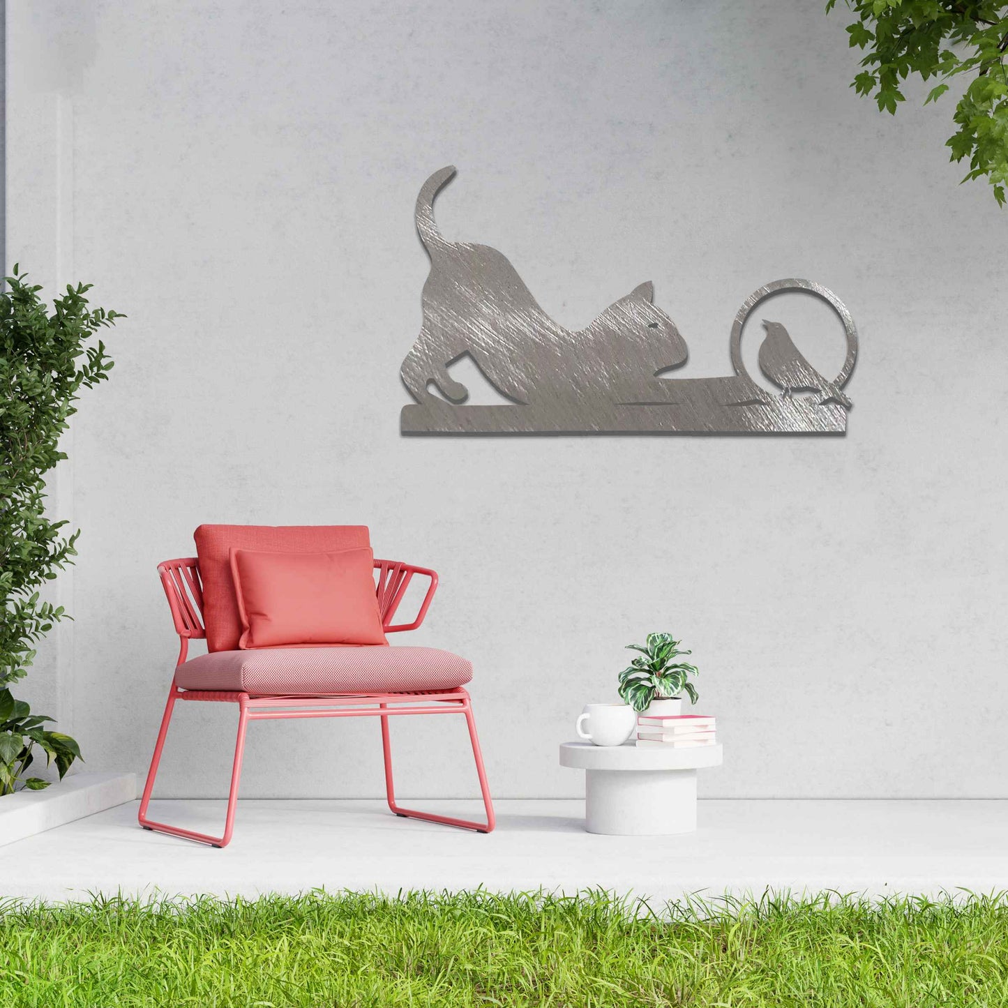 Metal wall art featuring a playful cat crouching in curiosity with a bird perched nearby, perfect for adding a touch of whimsy and nature-inspired charm to your garden, fence, or outdoor decor.