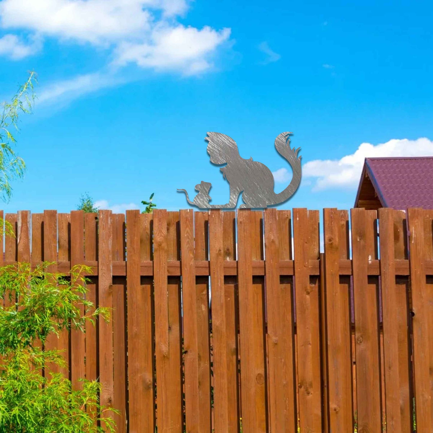 Metal garden decoration featuring a silhouette of a cat and mouse in a playful pose, adding a whimsical and rustic charm to outdoor spaces, perfectly suited for fence tops or garden walls.