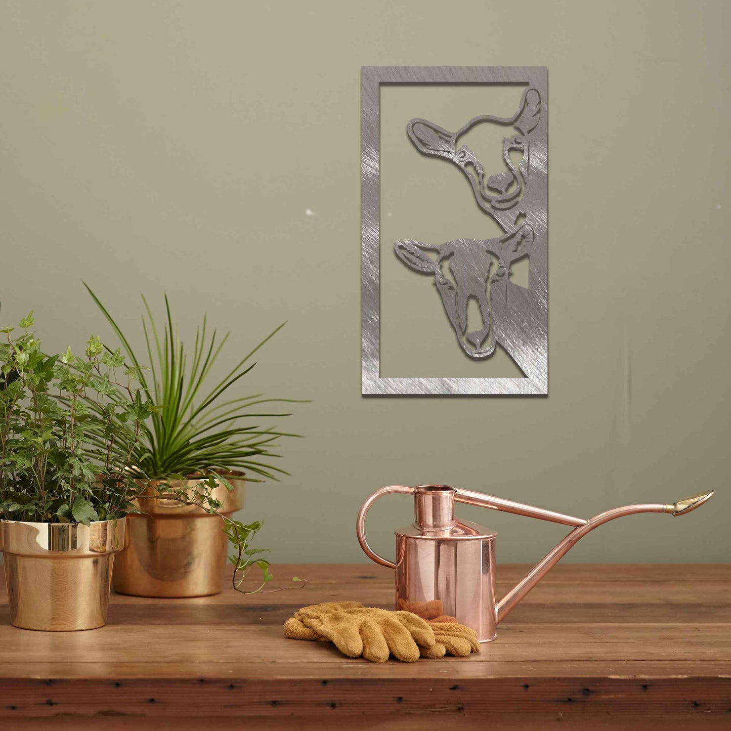 A striking design showcasing the faces of two goats, framed in a vertical panel. The detailed depiction of their expressions brings a unique charm to this modern, rustic wall art piece.