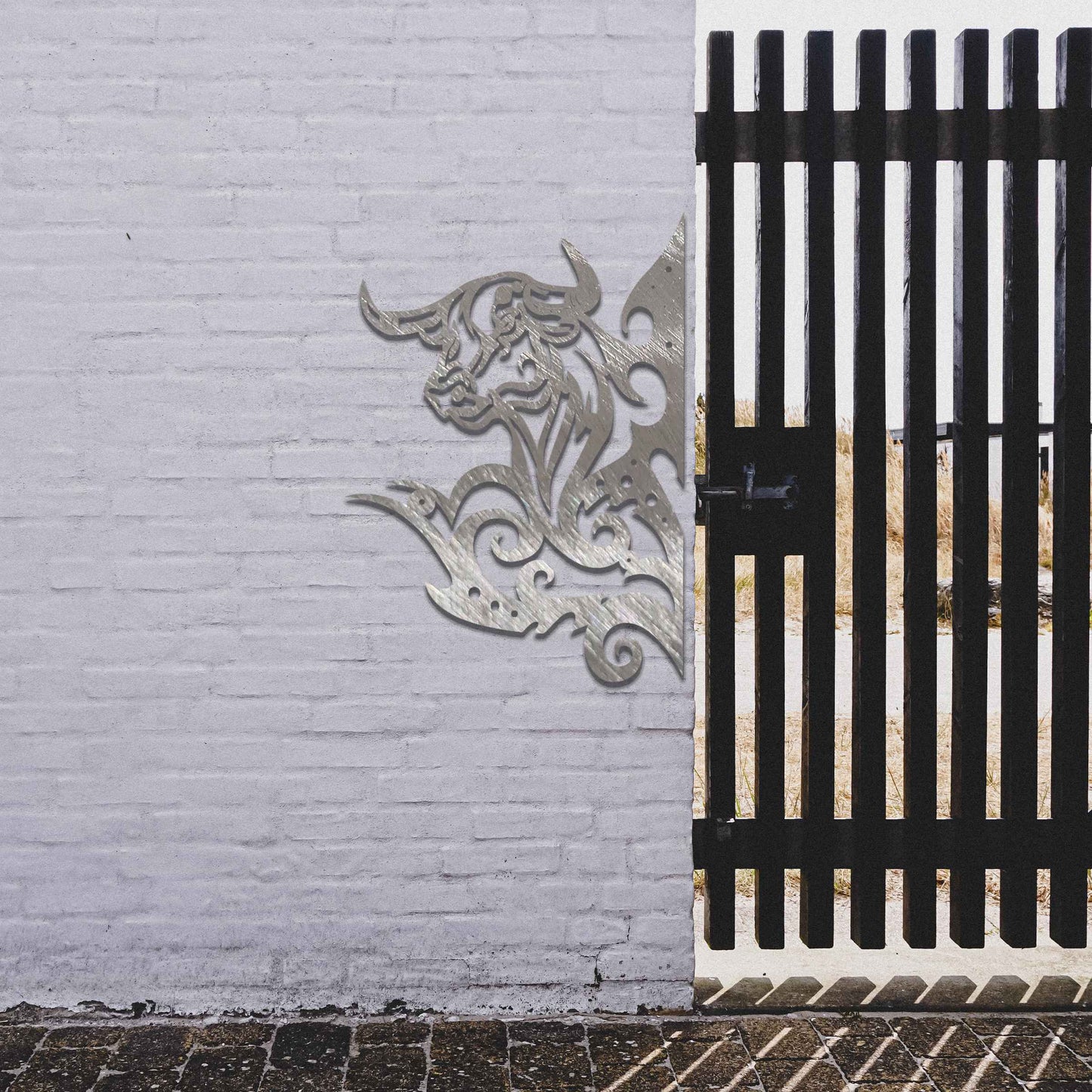 This design showcases a bull's head surrounded by dynamic, swirling lines. The intricate detailing captures the strength and power of the bull, with the bold and stylized swirls adding a sense of motion and energy.