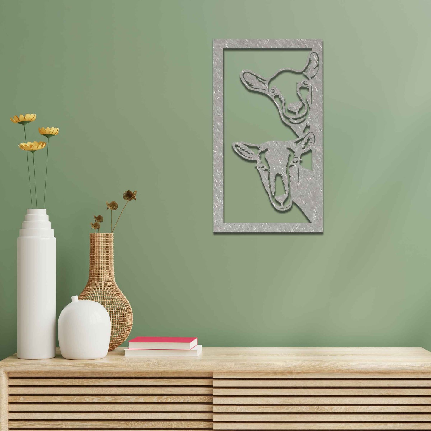 A striking design showcasing the faces of two goats, framed in a vertical panel. The detailed depiction of their expressions brings a unique charm to this modern, rustic wall art piece.