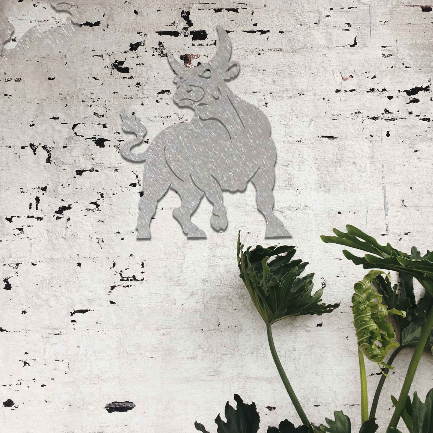 This design features a strong, dynamic bull with bold lines emphasizing its muscular structure and stance. The bull is depicted in an alert, powerful pose, capturing its essence of energy and determination.