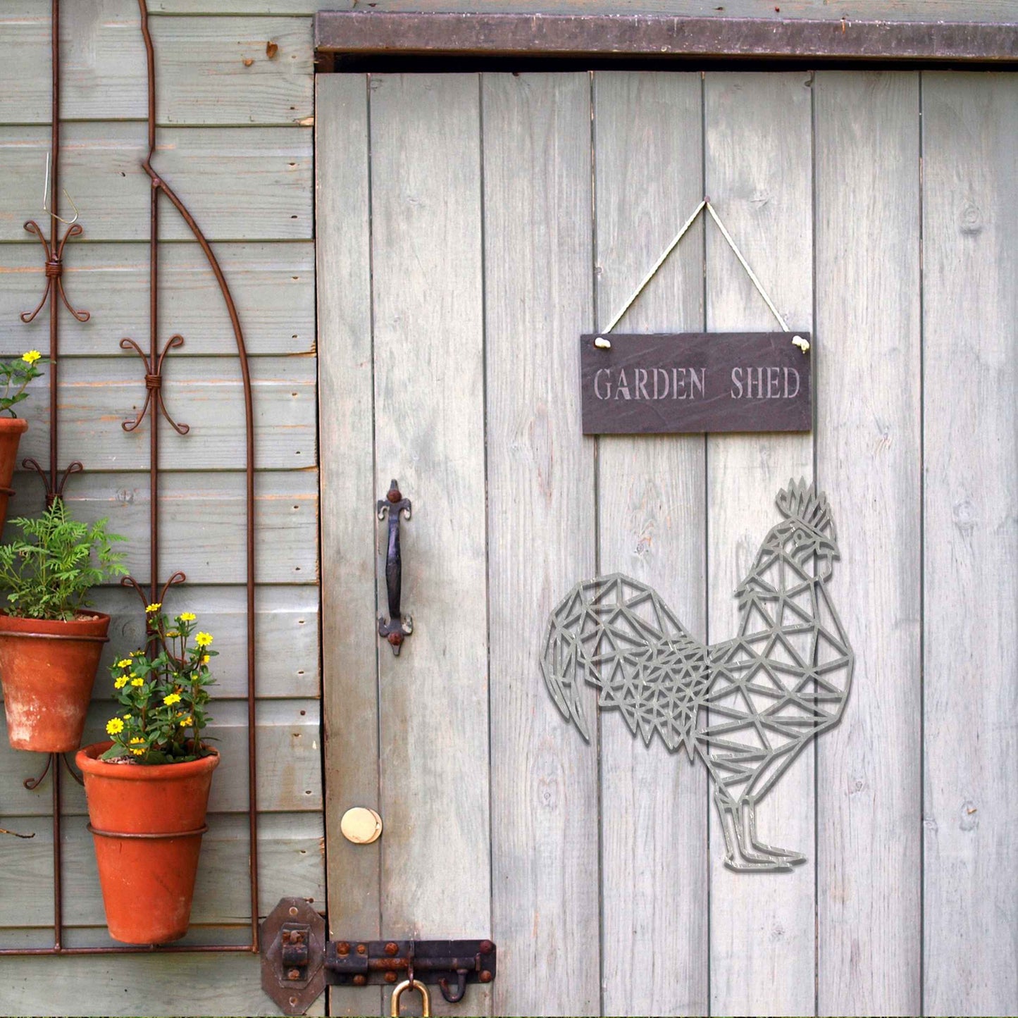 Geometric rooster wall art in a triangular design, made of metal. The rooster is intricately designed with sharp, angular lines that form its body, creating a modern and stylish piece perfect for contemporary spaces.