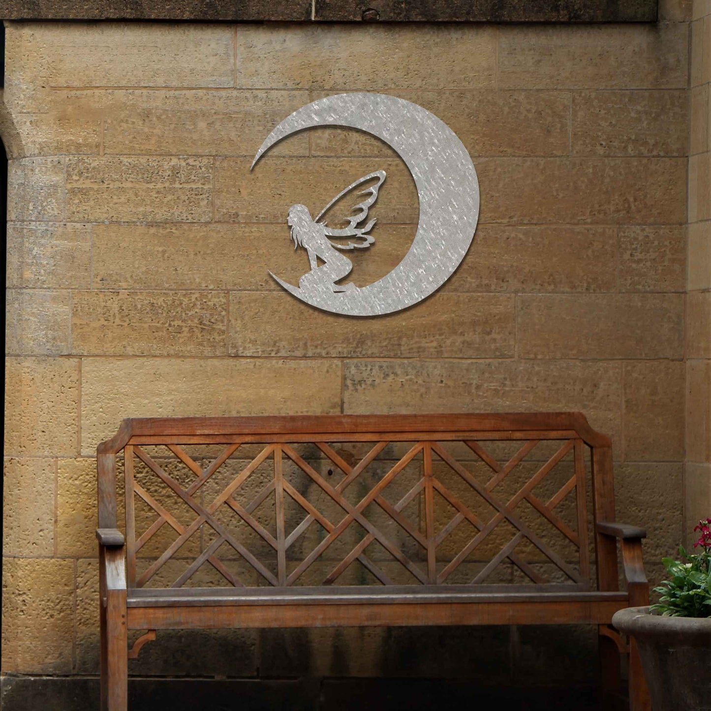 This design showcases a fairy sitting within the curve of a crescent moon, adding a mystical touch with delicate wings. The flowing, simple lines of the crescent and the fairy's posture create a peaceful, ethereal feeling, perfect for enhancing a serene space.