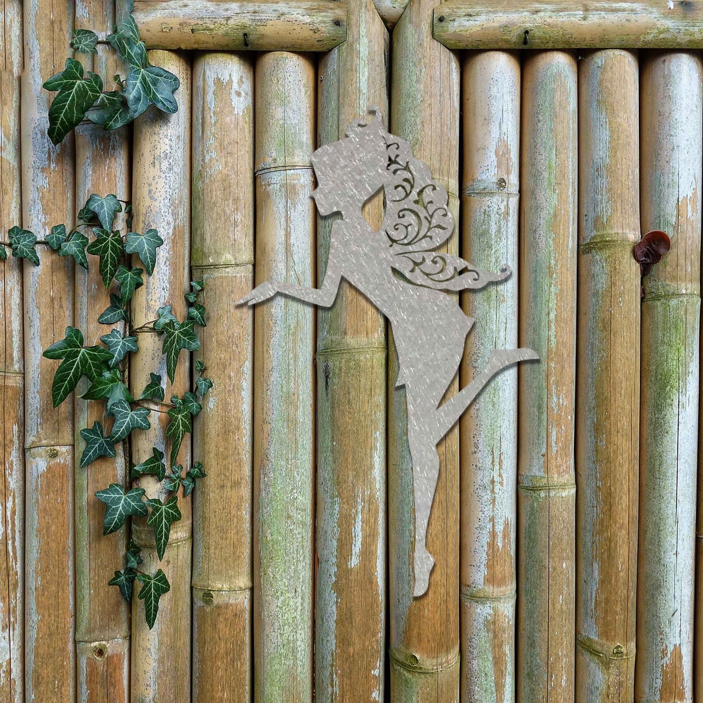 Thank you for the clarification! The design features a silhouette of a fairy in a graceful pose, with flowing hair and wings. The fairy is captured in mid-motion, bringing a sense of whimsy and elegance to the artwork.