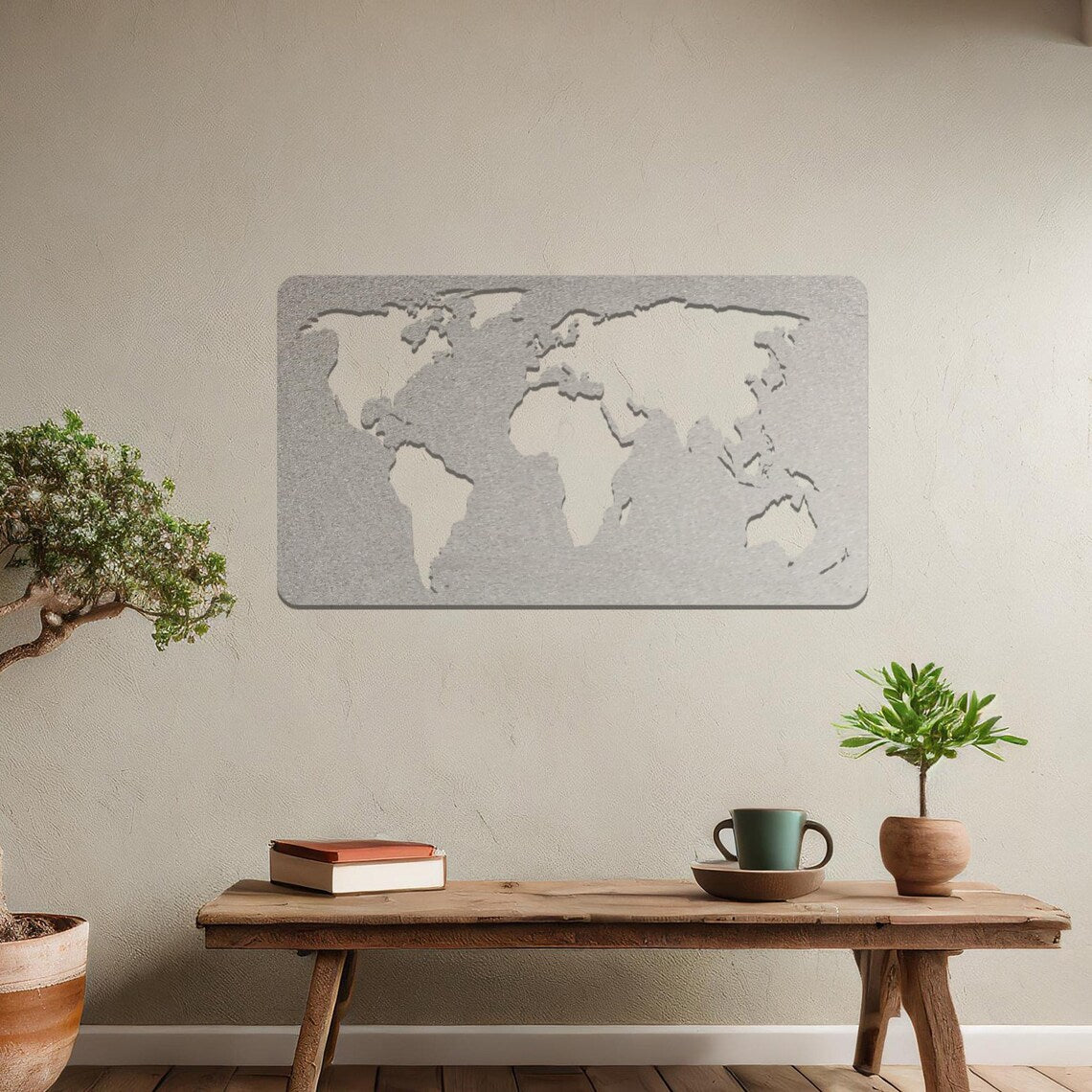 Metal wall art featuring a rectangular world map design with precise continent outlines, serving as a stylish and sophisticated addition to the space.