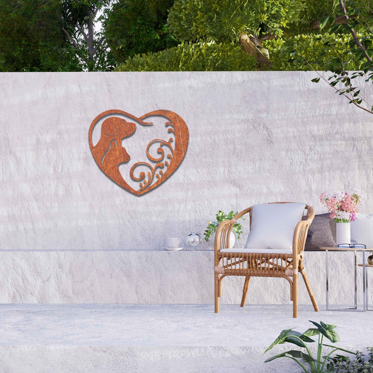 Metal garden decoration featuring a heart-shaped design with silhouettes of a dog and cat intertwined with elegant scrollwork, symbolising love for pets and adding a decorative charm to outdoor walls or garden spaces.