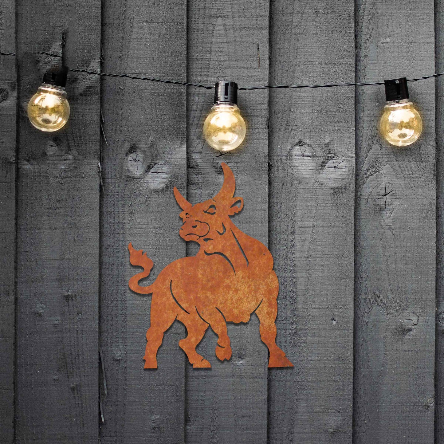 This design features a strong, dynamic bull with bold lines emphasizing its muscular structure and stance. The bull is depicted in an alert, powerful pose, capturing its essence of energy and determination.