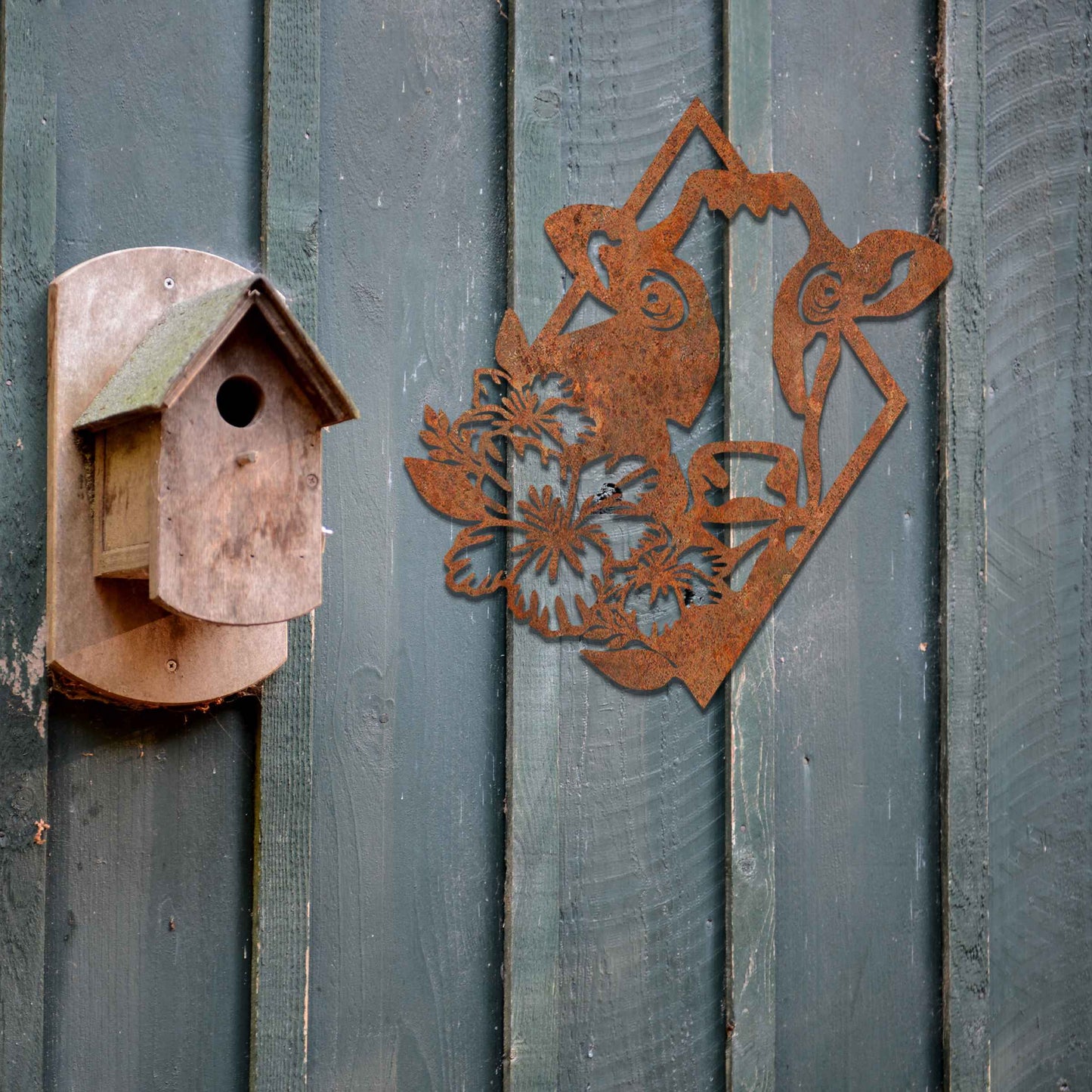 The design features a cow's face framed by a geometric shape, with flowers on its side, combining natural and abstract elements in a modern, stylized way.