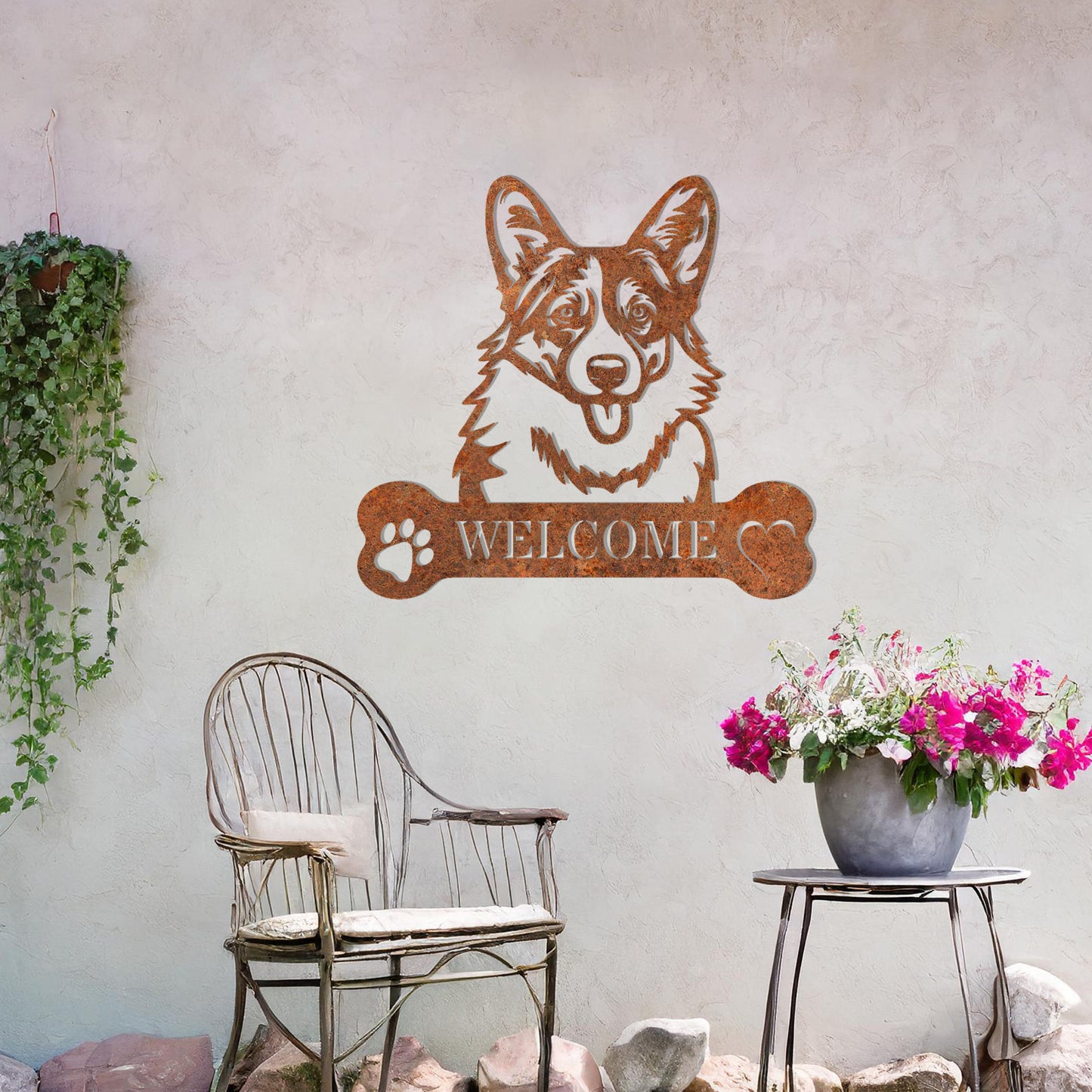 Metal Pembroke Welsh Corgi dog design with a bone-shaped 'WELCOME' text and paw prints, perfect for adding a charming and welcoming touch to entryways or outdoor spaces.