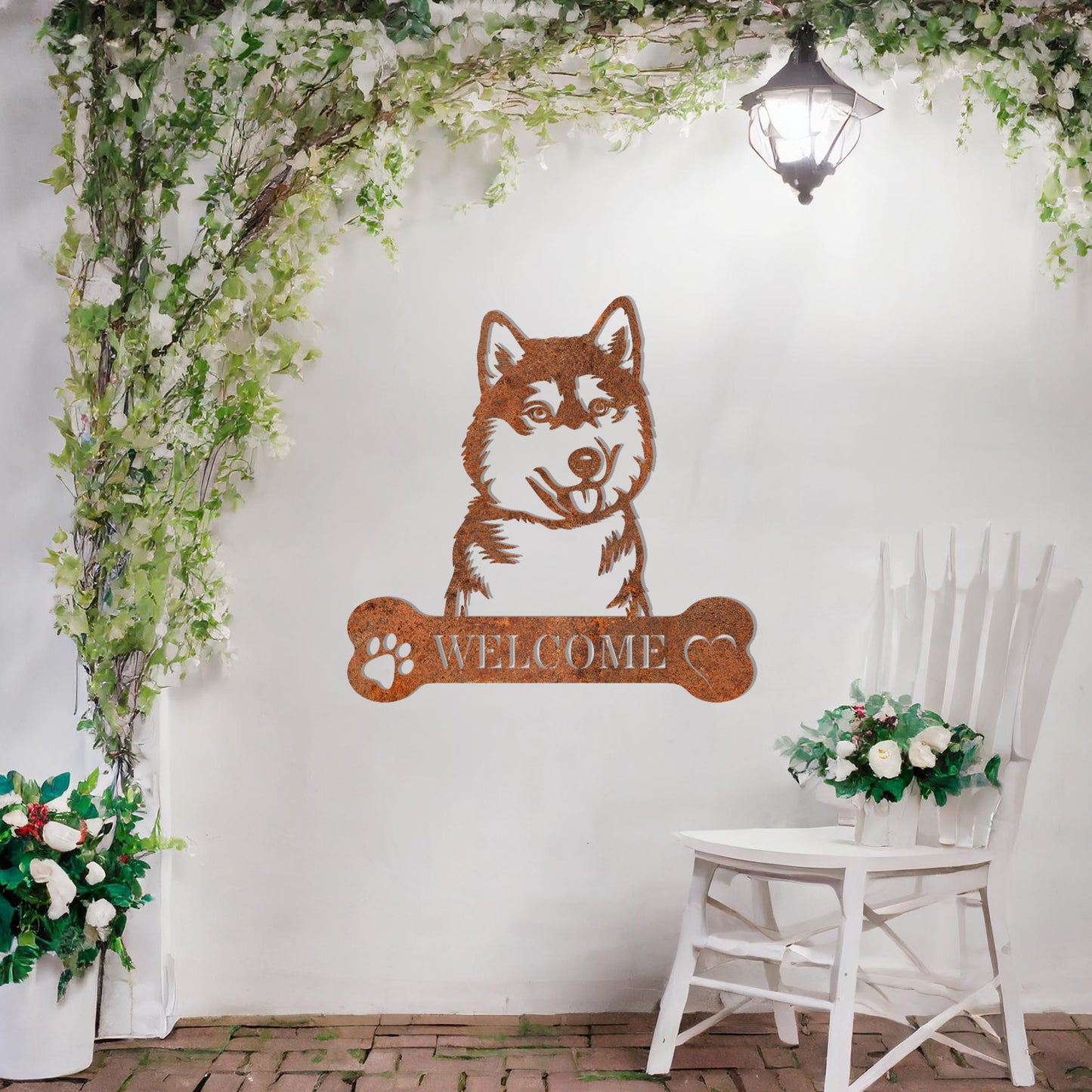 Metal Siberian Husky dog design with a bone-shaped 'WELCOME' text and paw prints, perfect for adding a friendly and welcoming touch to entryways or outdoor spaces.