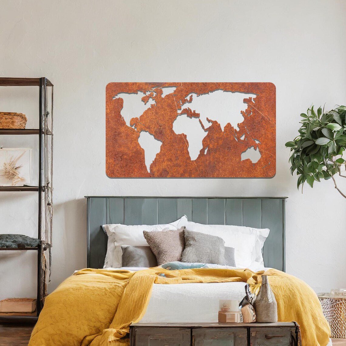 Metal wall art featuring a rectangular world map design with precise continent outlines, serving as a stylish and sophisticated addition to the space.