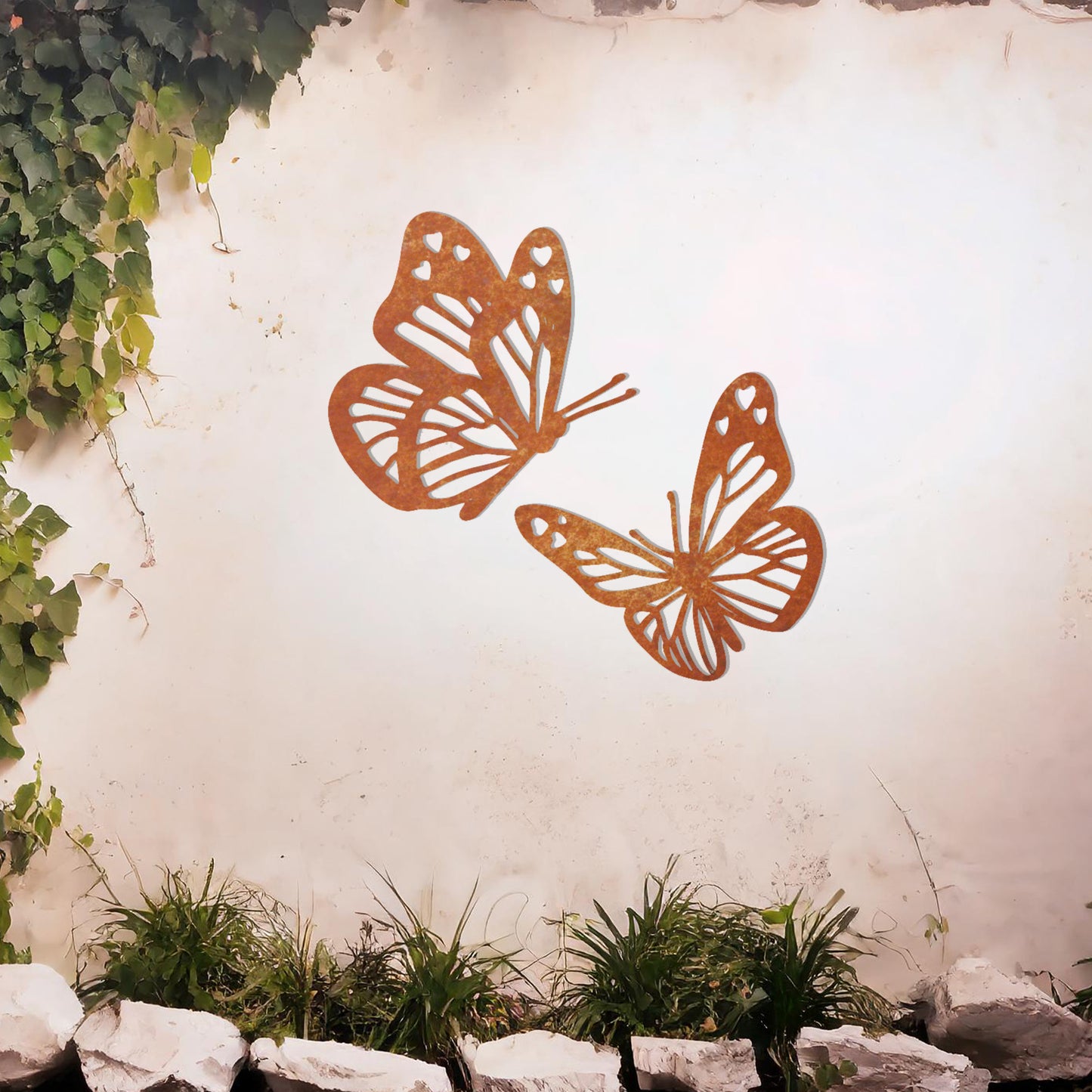This design showcases a pair of intricately detailed butterflies in flight, their delicate wings adorned with heart-shaped accents. A charming addition to any space, celebrating the beauty of nature and the grace of butterflies.