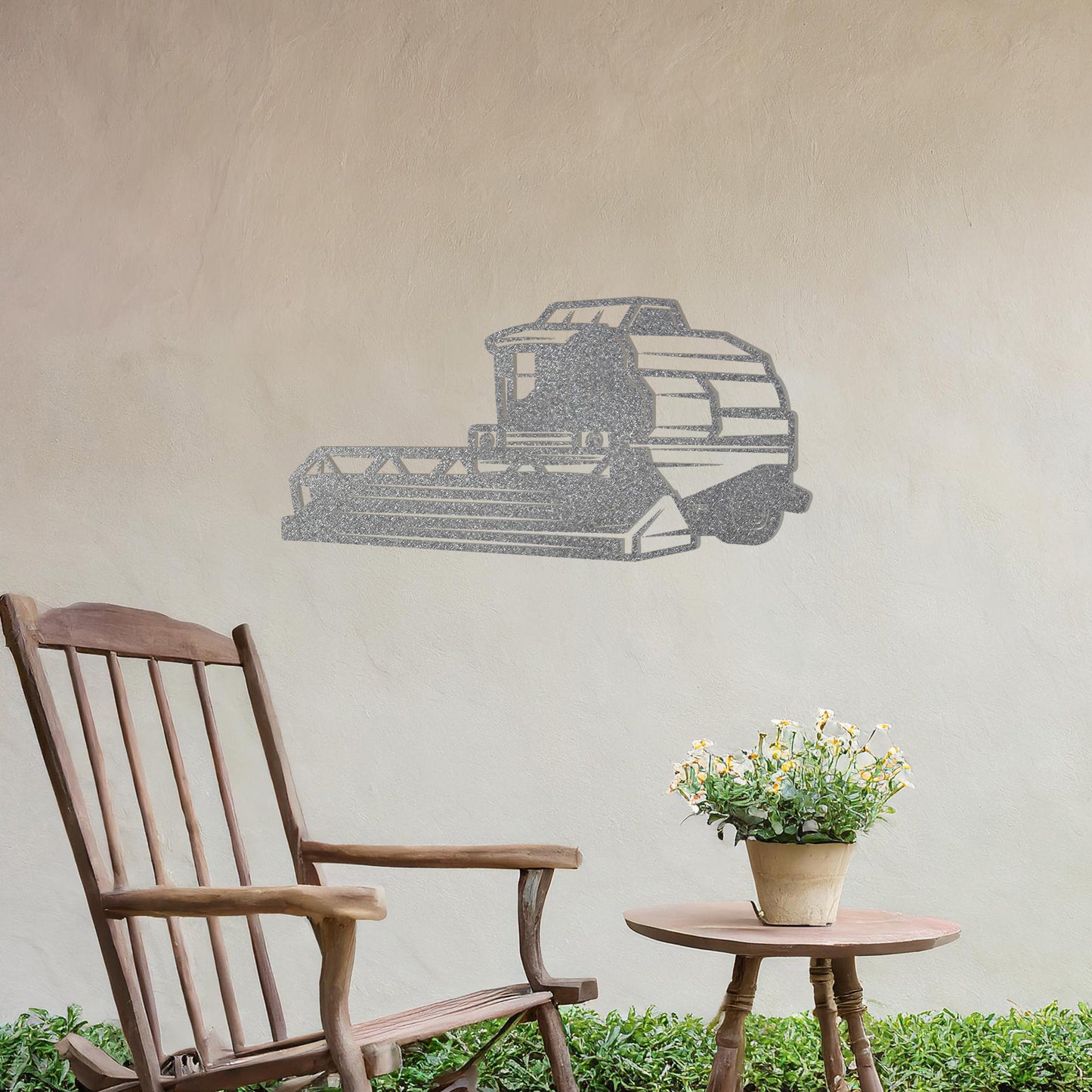 Metal wall art featuring a detailed illustration of a combine harvester, designed with bold lines and geometric shapes, ideal for those passionate about farming or agriculture.