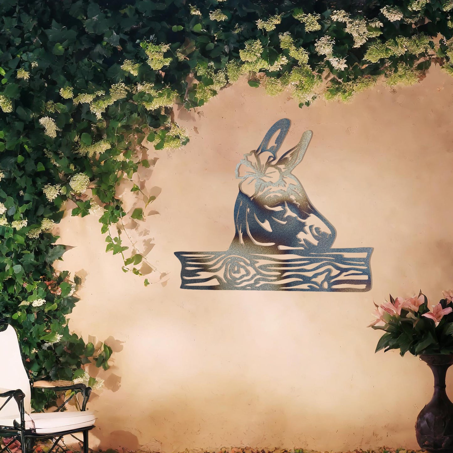 This wall art design showcases a beautifully detailed donkey head adorned with a flower, resting atop a wooden plank-like base. A charming and rustic piece perfect for farmhouse decor or animal enthusiasts.