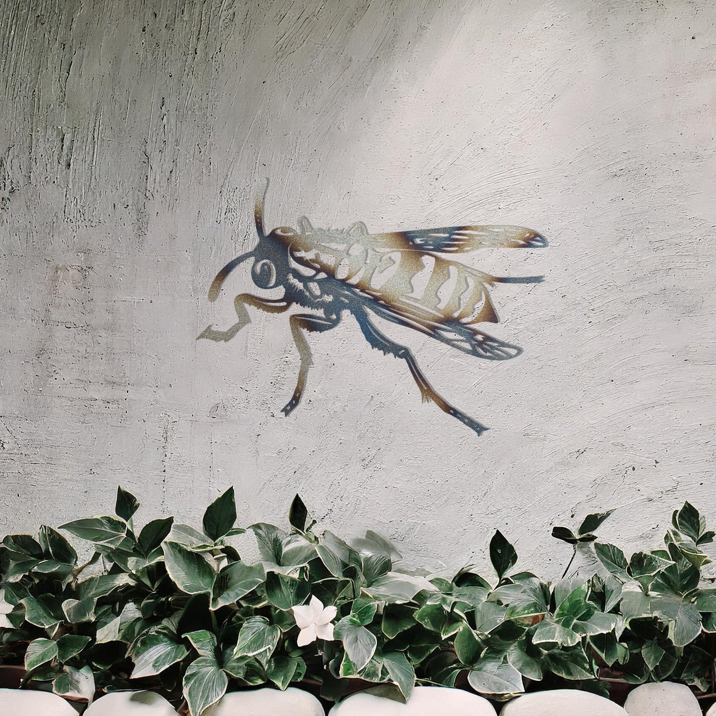 The design features a highly detailed wasp in mid-flight, showcasing intricate lines and patterns on its body and wings. The artwork is displayed above a tranquil water feature, highlighting the insect’s dynamic form.