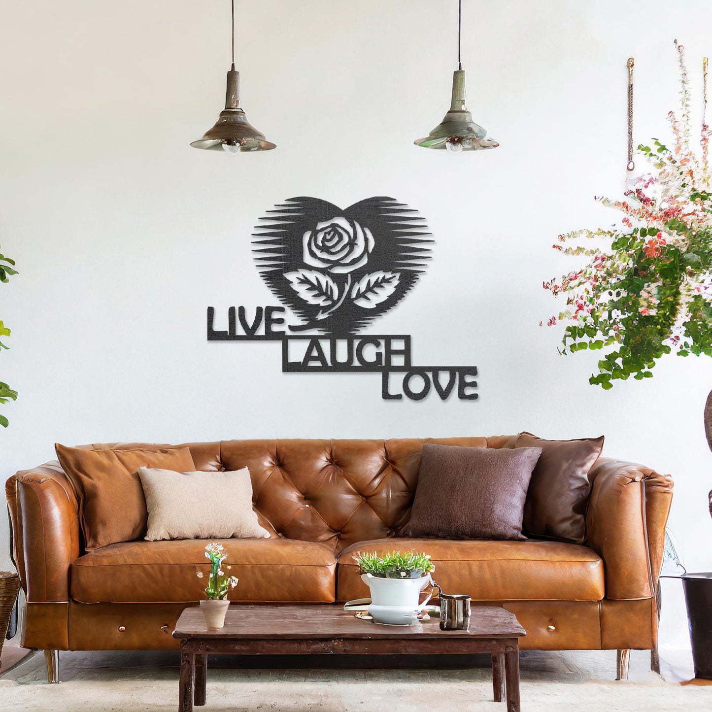 The design features the phrase "LIVE LAUGH LOVE" arranged in a staggered layout, with a rose inside a heart shape above the text. The clean, geometric lines of the text and the heart-shaped rose create a striking, modern look.