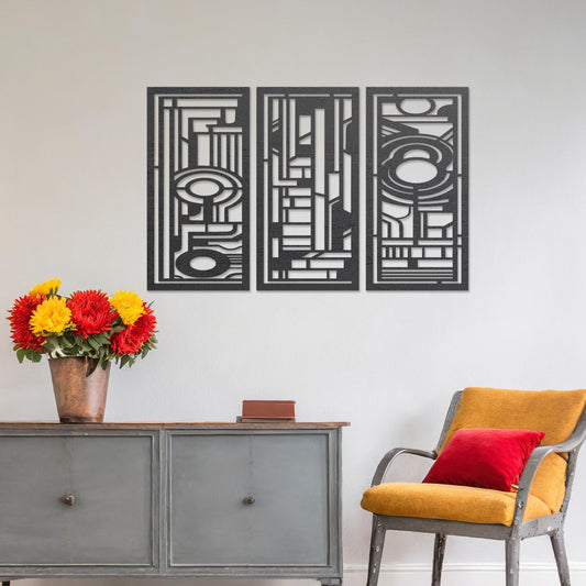 Wall art featuring a triptych of abstract geometric patterns with layered lines and circular elements. The pieces are displayed on a neutral wall within modern decor, adding a bold and contemporary focal point to the space.