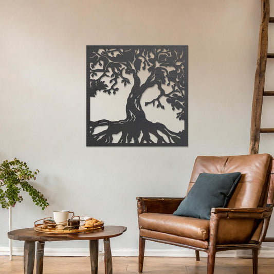 Wall art featuring a detailed tree of life design with sprawling branches and roots, symbolising growth and connection. The piece is displayed on a neutral wall within rustic-modern decor, adding a natural and meaningful focal point to the space.