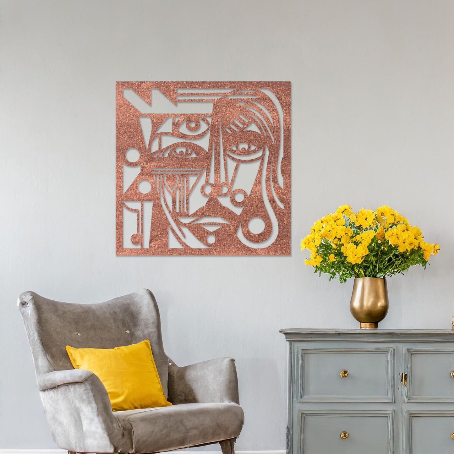 Wall art featuring an abstract face design with intricate geometric patterns and bold linework. The piece is displayed on a neutral wall within modern decor, adding a striking and artistic focal point to the space.
