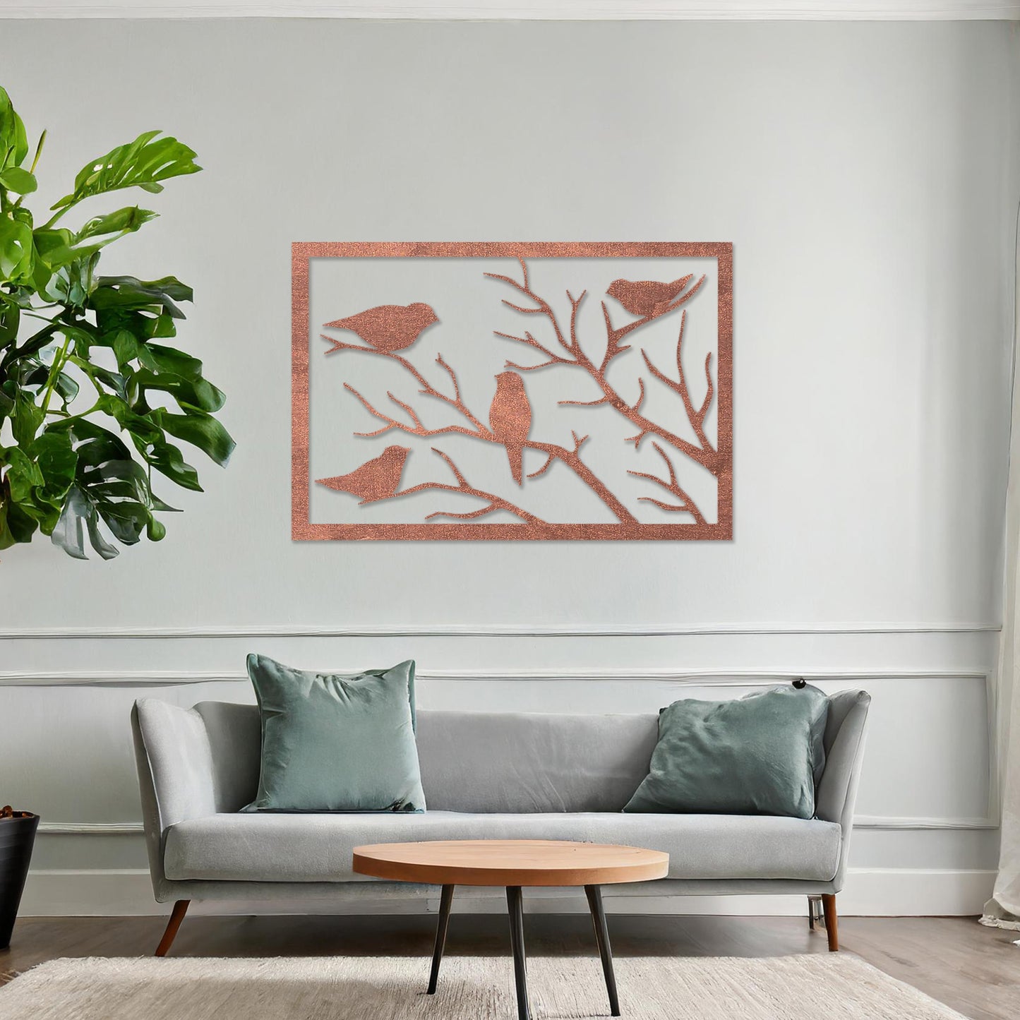 Wooden wall art featuring a rectangular design with birds perched on tree branches, displayed on a neutral wall within modern room decor, highlighting its elegant and nature-inspired craftsmanship.