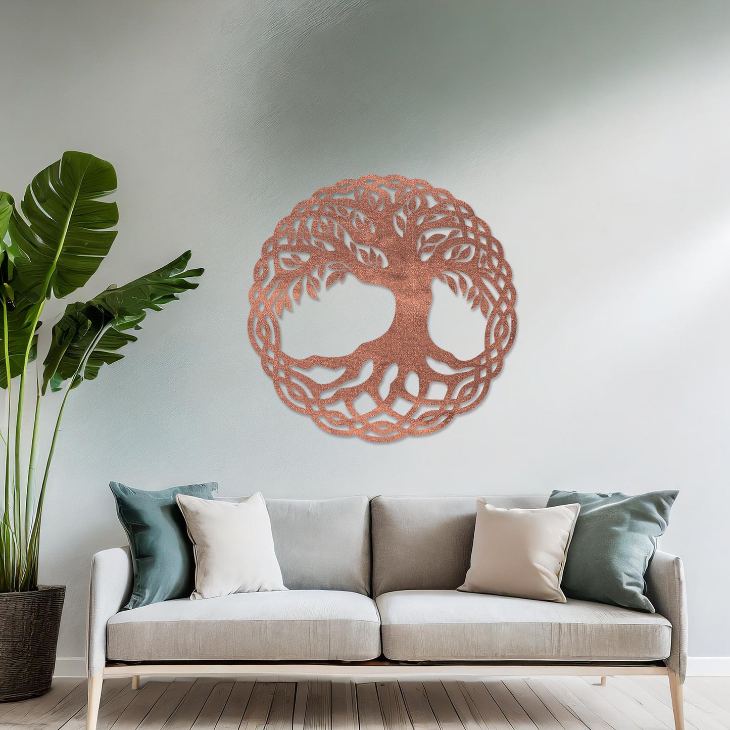 Wooden wall art featuring a circular tree of life design with intertwined roots and branches, displayed on a neutral wall within modern room decor, highlighting its symbolic and intricate craftsmanship.