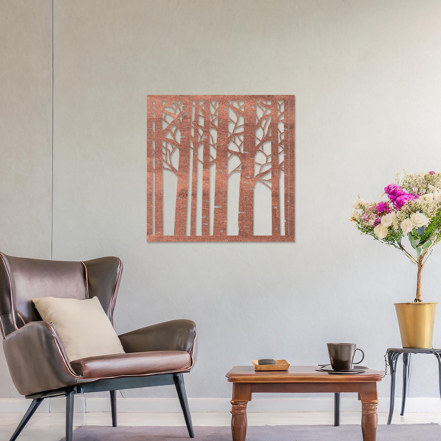 Wooden wall art featuring a square design with a forest motif of tall, slender trees and intricate branch details. The artwork is displayed on a neutral wall within modern room decor, creating a serene and nature-inspired aesthetic.