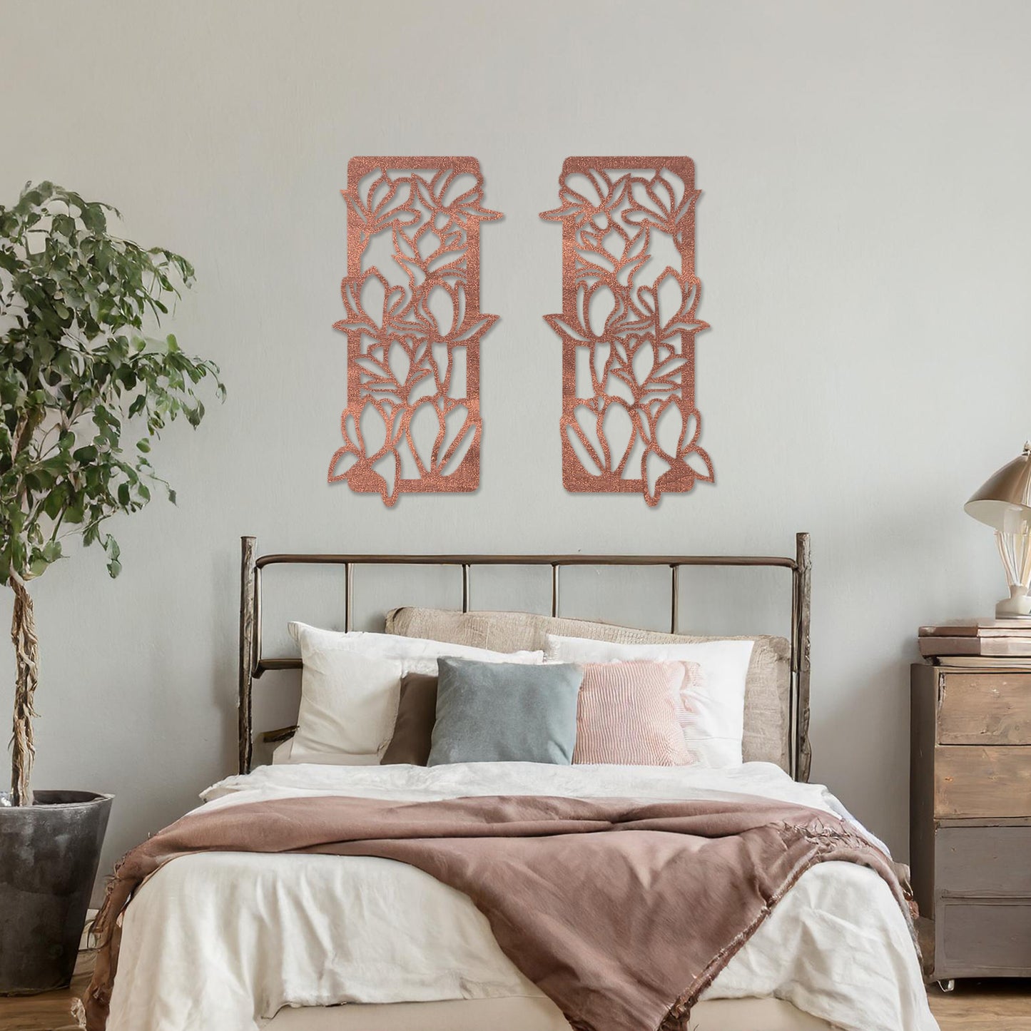 Wooden wall art featuring two rectangular panels with a floral vine design, displayed on a neutral wall within modern room decor, highlighting its elegant and nature-inspired craftsmanship.