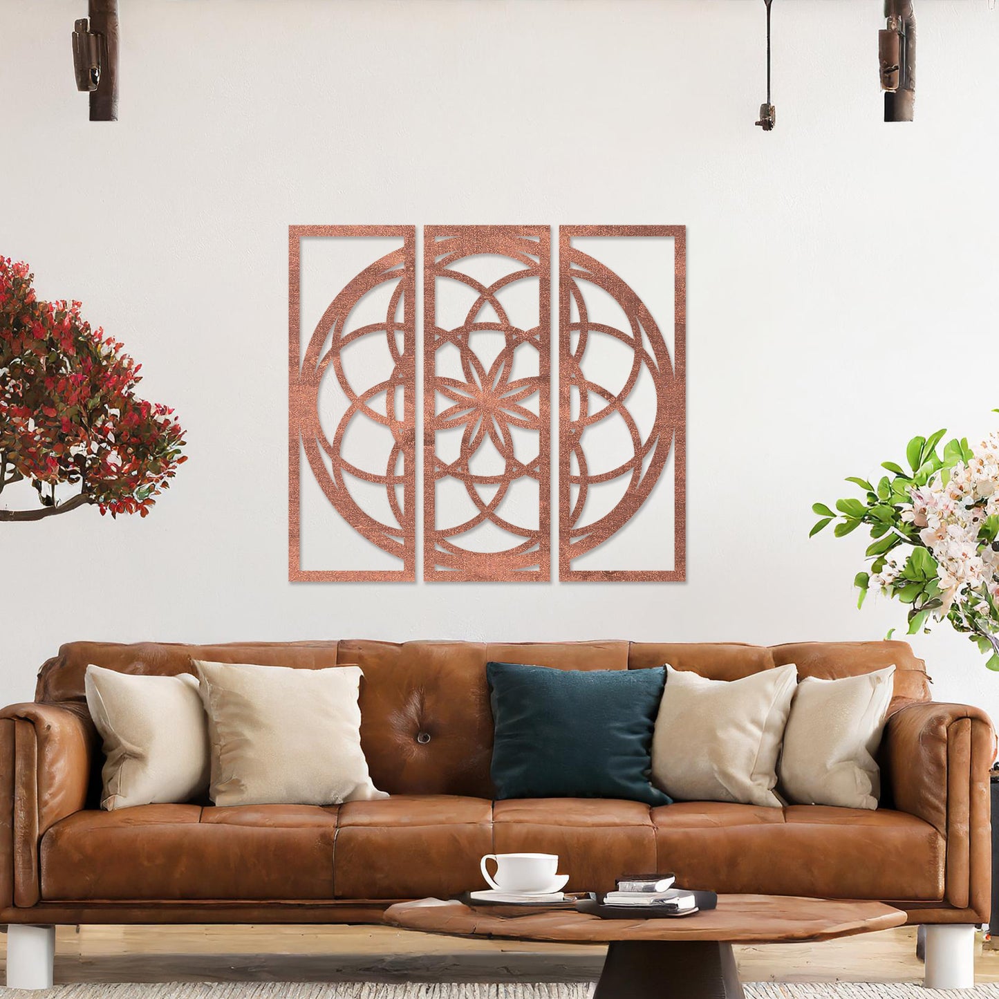 Wall art featuring a triptych design with an intricate geometric pattern of interlocking circles and floral elements. The artwork is displayed on a neutral wall within modern decor, adding a balanced and artistic focal point to the space.