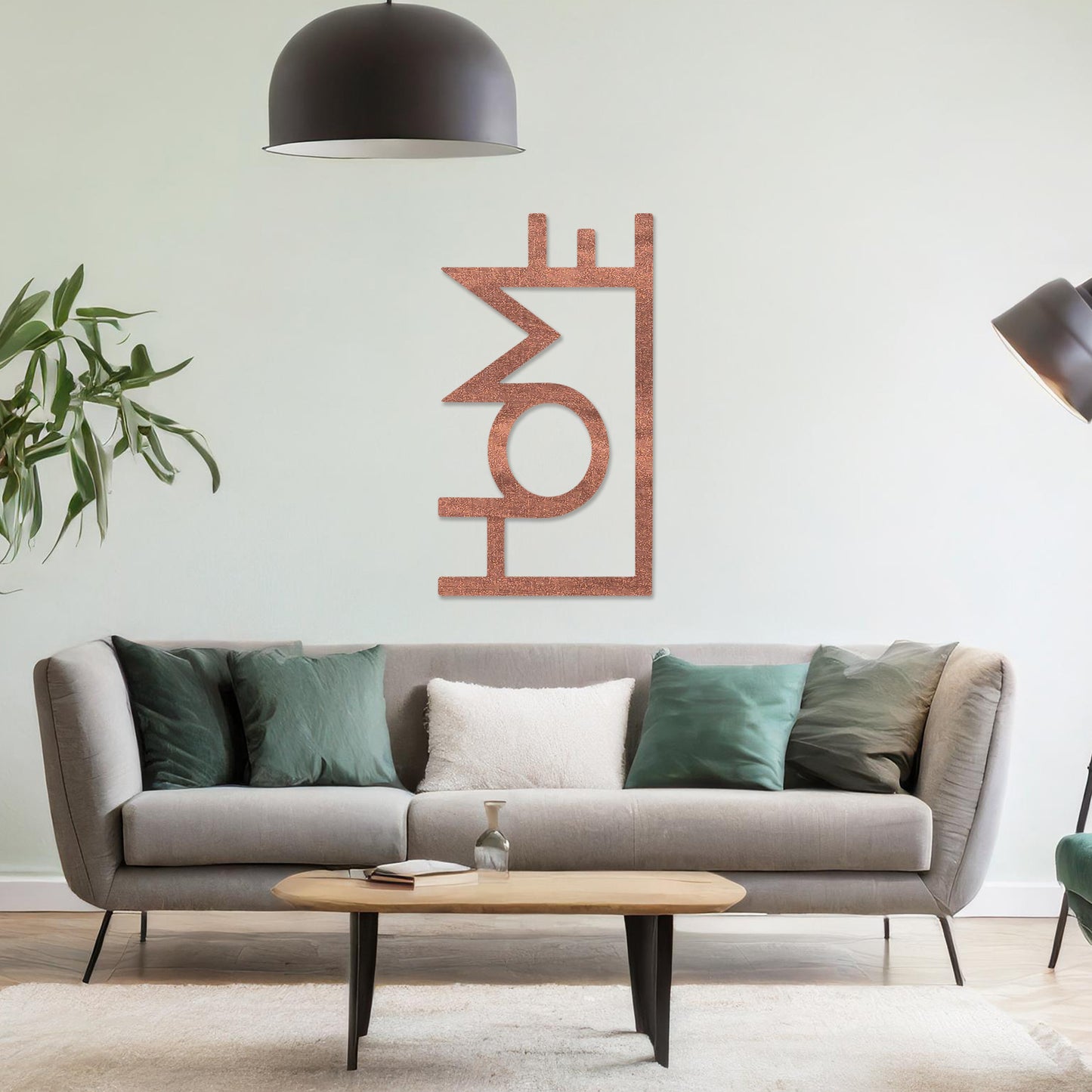 Wall art featuring the word "HOME" in a bold, modern design with geometric shapes integrated into the lettering. The piece is displayed on a neutral wall within contemporary room decor, adding a stylish and welcoming touch to the space.