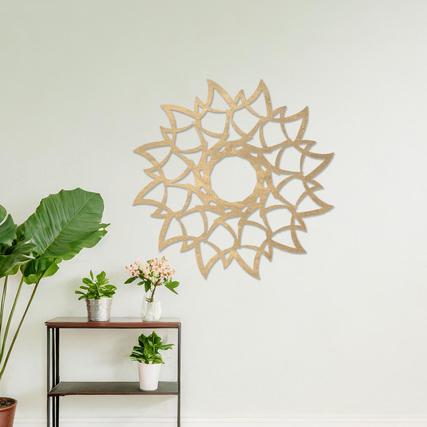 Wooden wall art featuring a circular mandala-inspired design with intricate petal-like patterns, displayed on a neutral wall within modern room decor, showcasing its elegant and detailed craftsmanship.