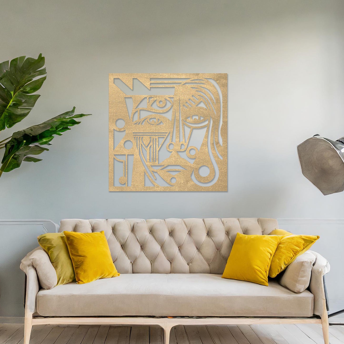 Wall art featuring an abstract face design with intricate geometric patterns and bold linework. The piece is displayed on a neutral wall within modern decor, adding a striking and artistic focal point to the space.