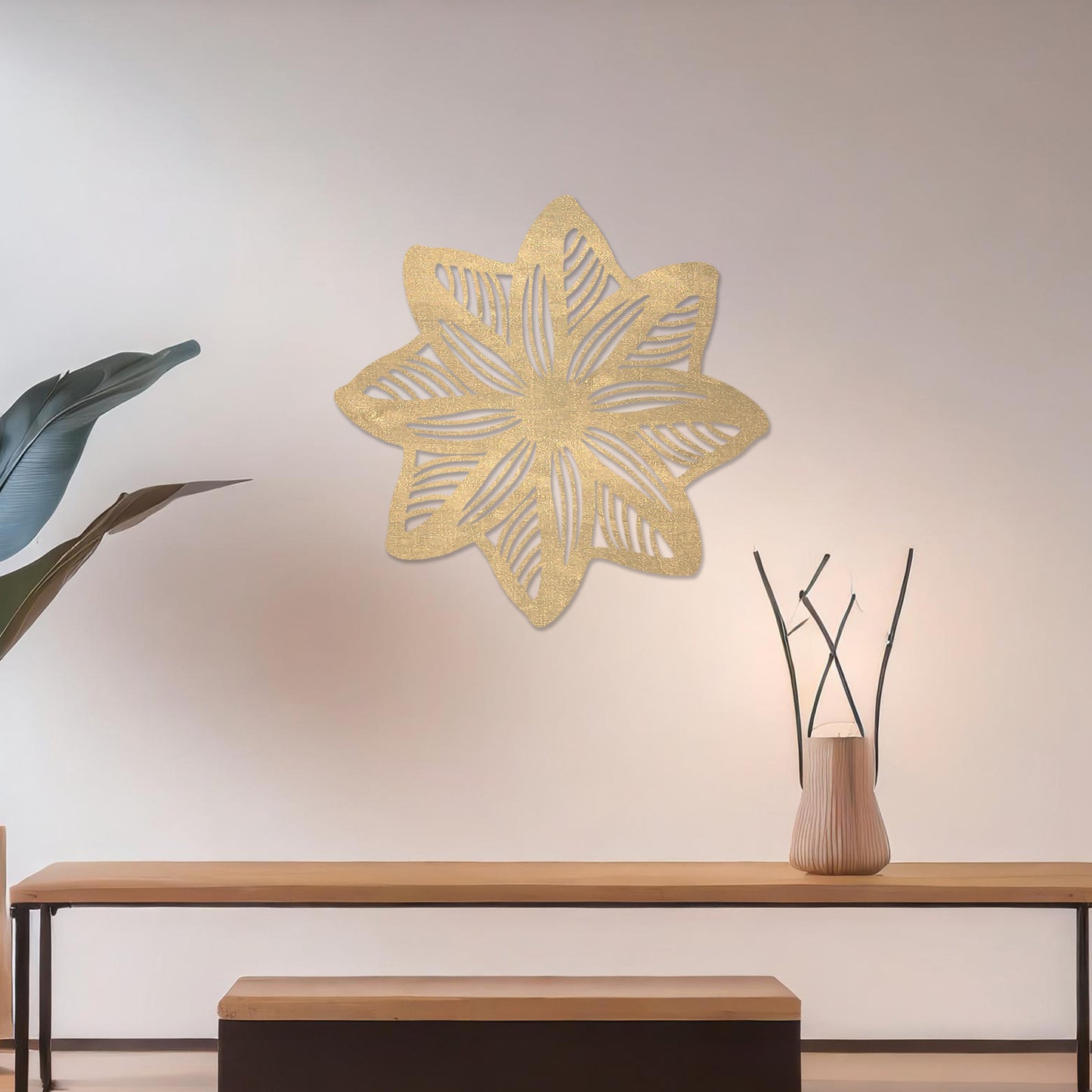 Wall art featuring a star-shaped floral design with layered petals and intricate cut-out patterns. The piece is displayed on a neutral wall within modern decor, adding a unique and decorative focal point to the space.