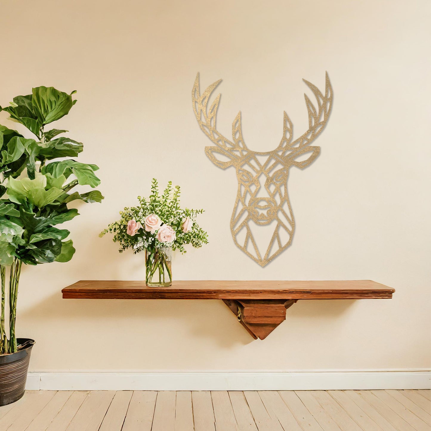Wooden wall art featuring a geometric deer head design with intricate antlers, displayed on a neutral wall within modern room decor, showcasing its bold and contemporary artistic style.