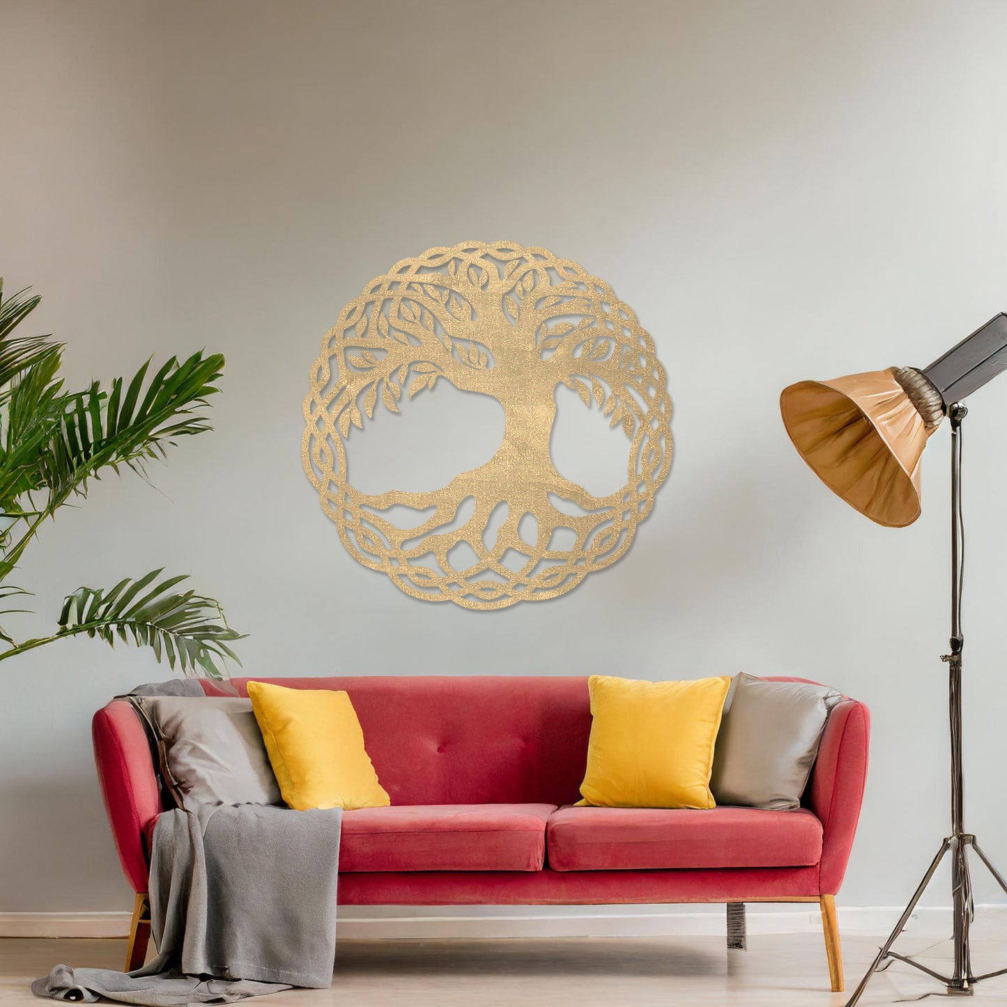 Wooden wall art featuring a circular tree of life design with intertwined roots and branches, displayed on a neutral wall within modern room decor, highlighting its symbolic and intricate craftsmanship.