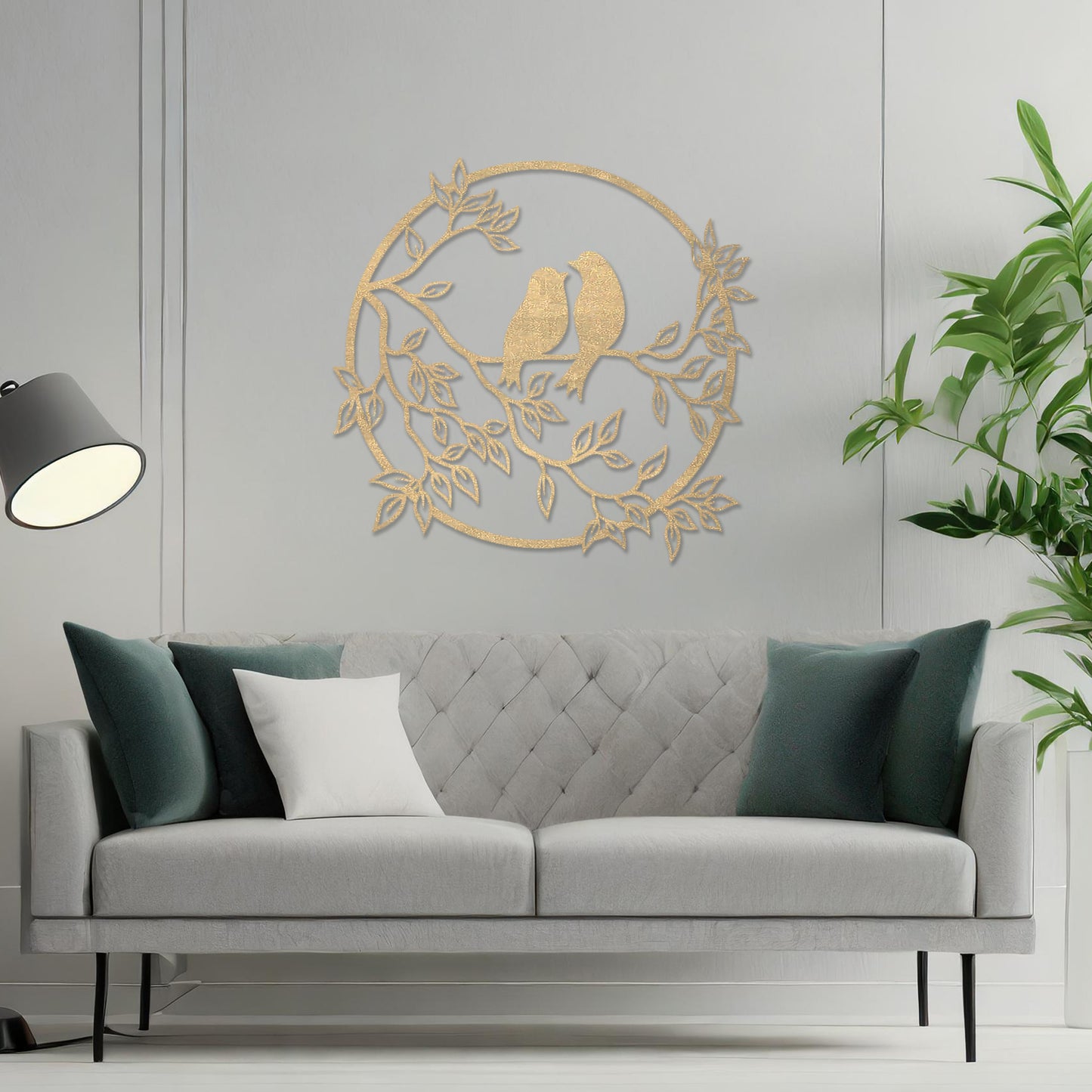 Wooden wall art featuring a circular design with two birds perched on a branch surrounded by leaves, displayed on a neutral wall within modern room decor, showcasing its delicate and nature-inspired craftsmanship.