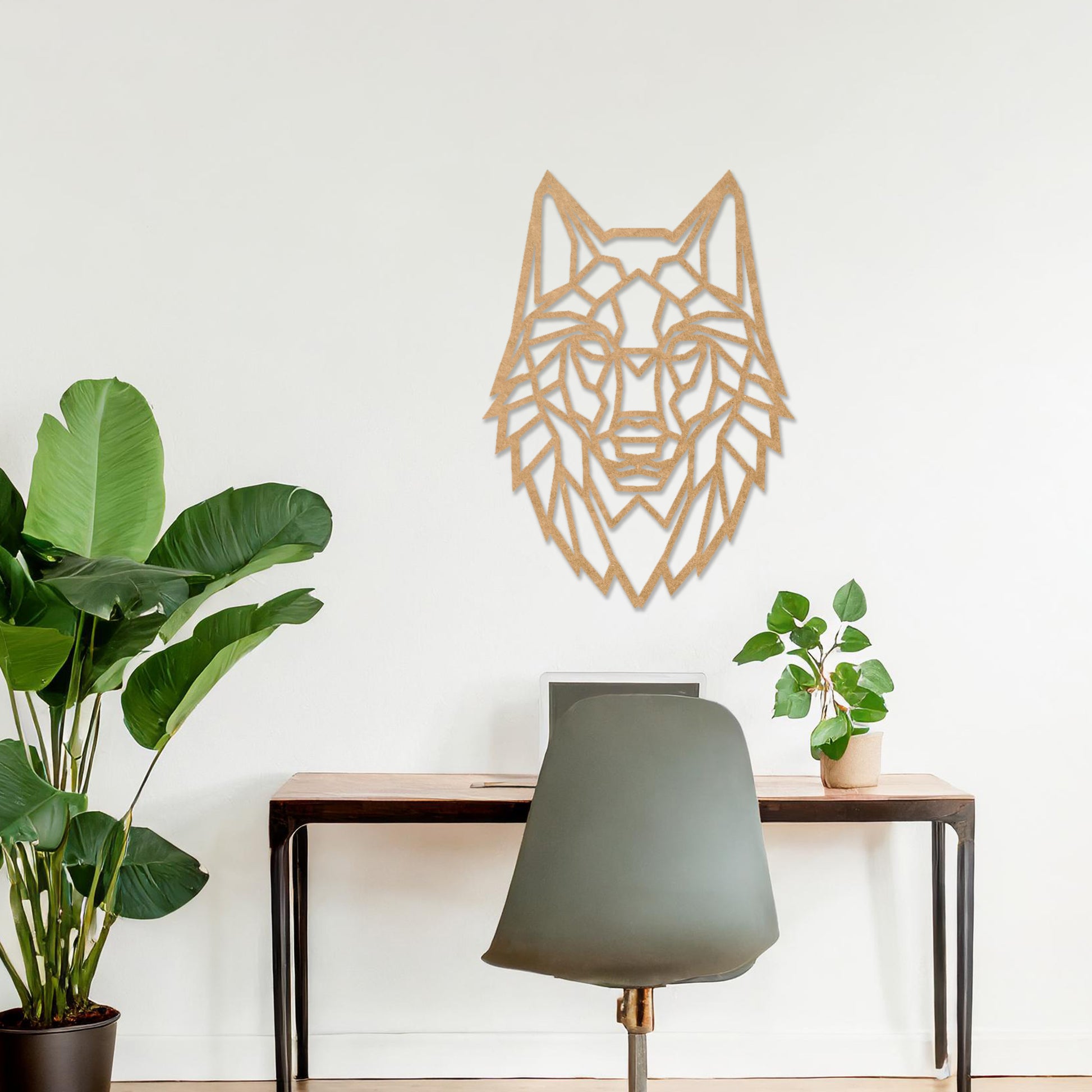 Wooden wall art featuring a geometric wolf design with sharp, angular lines. The artwork is displayed on a neutral wall within modern room decor, drawing attention to its bold and intricate pattern.
