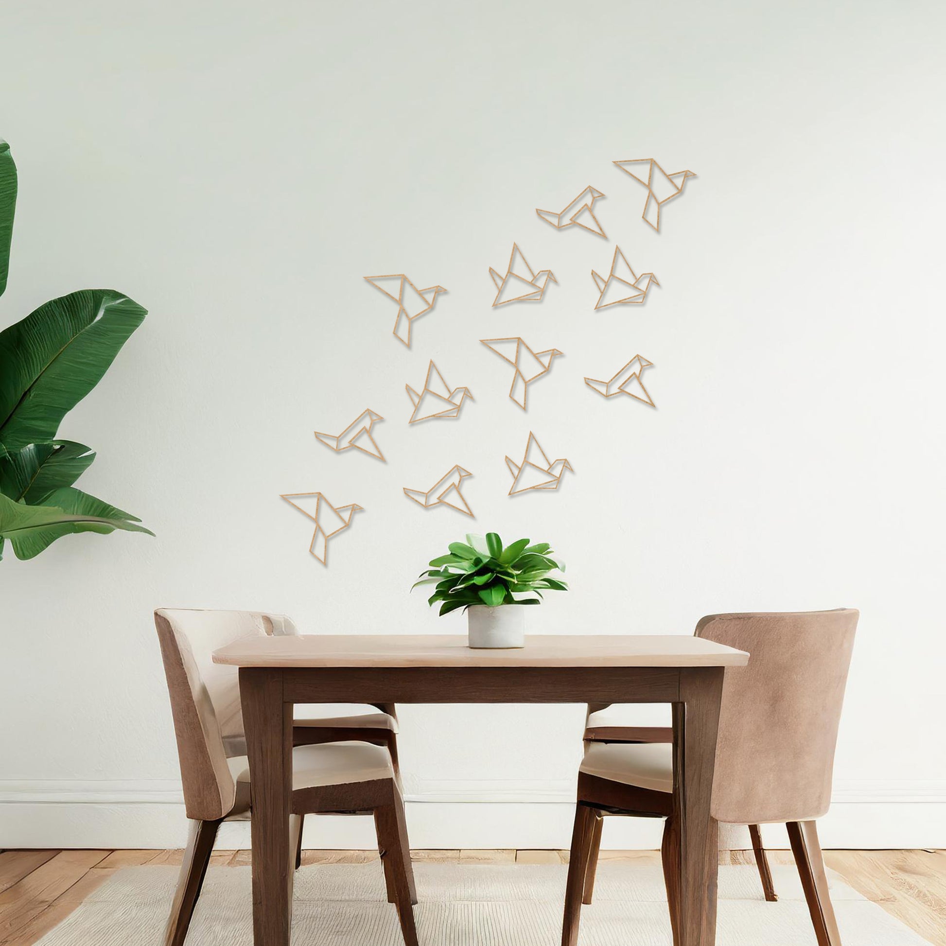 Wooden wall art featuring a flock of geometric bird designs in a scattered arrangement, creating a sense of movement. The artwork is displayed on a neutral wall within modern room decor, highlighting its dynamic and minimalist aesthetic.